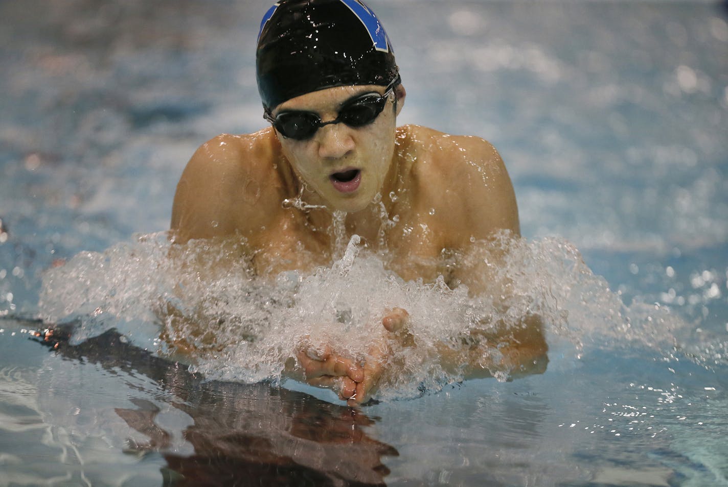 Will Ho swimmer at Woodbury High school worked on his stroke January 20, 2015 Woodbury, MN.] Jerry Holt/ Jerry.Holt@Startribune.com