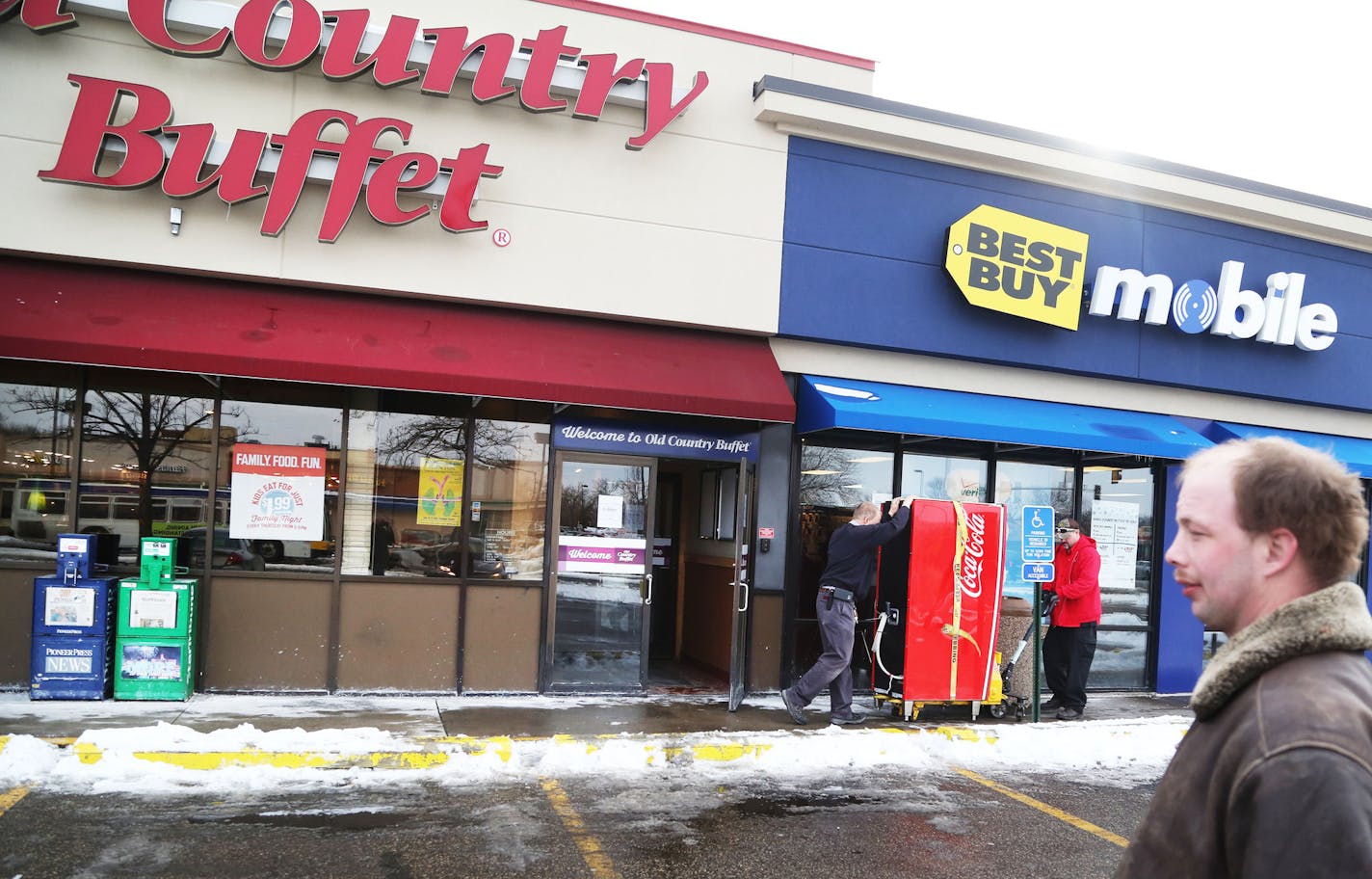 Among the Old Country Buffet restaurants that abruptly closed is this one at 66th Street and Nicollet Avenue was seen Friday, Feb. 5, 2016, in Richfield, MN. Here, vendors from Coke remove one of their machines as an Old Country Buffet employee who did not give his name watches on what he says is his last day. The employee said he has worked at Old Country Buffet for four years and got a call at 2 a.m. Thursday morning from management saying the restaurant had shut down and he was to report to w