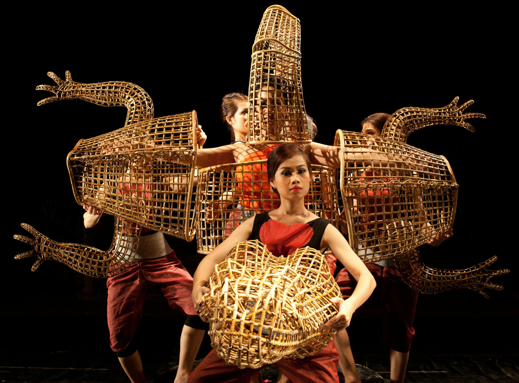 Members of Khmer Arts Ensemble perform "A Bend in the River." which incorporates crocodile sculptures by Sopheap Pich.