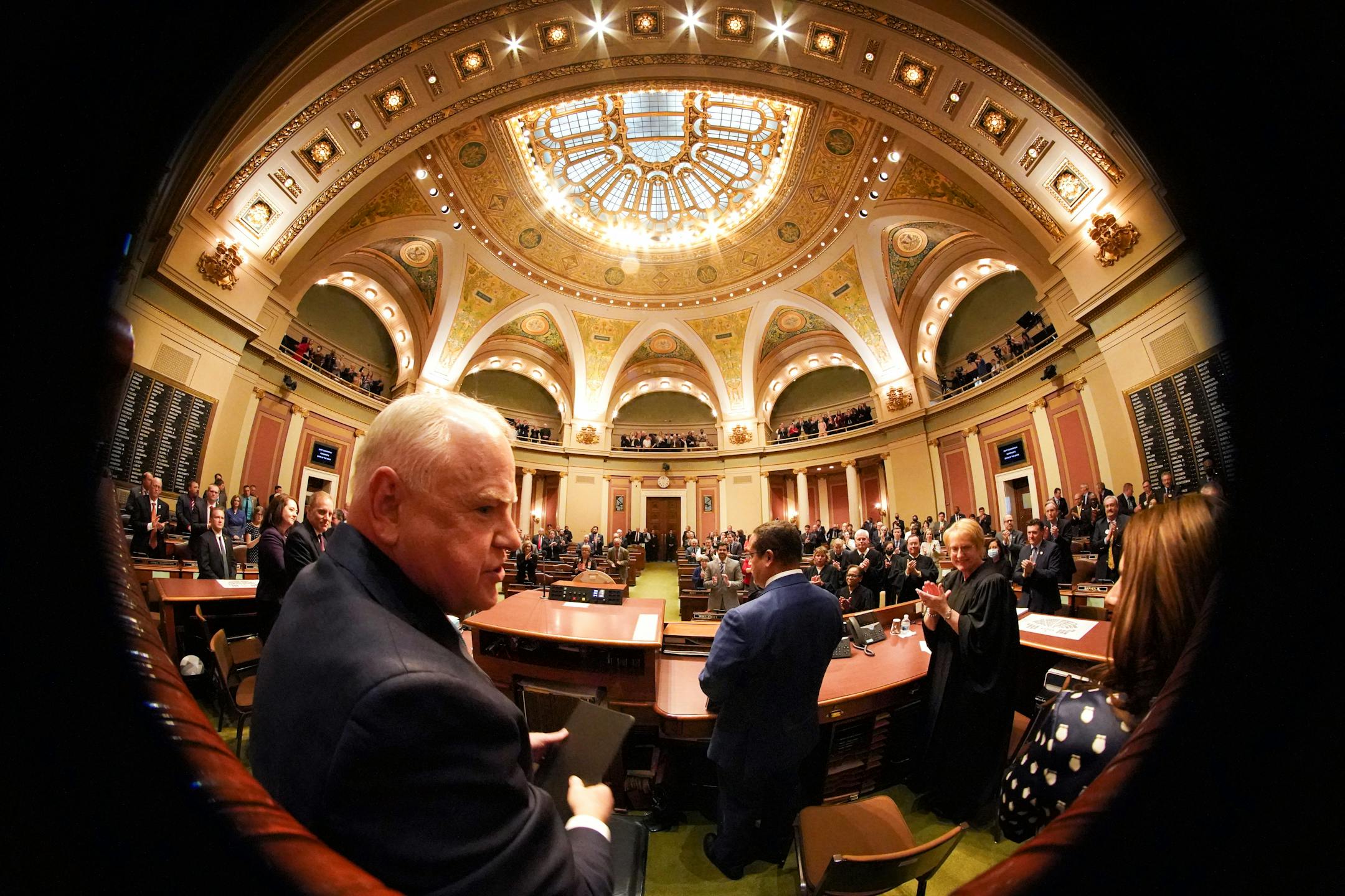 Gov. Tim Walz waved to friends and supporters in the House galleries after his State of the State address.