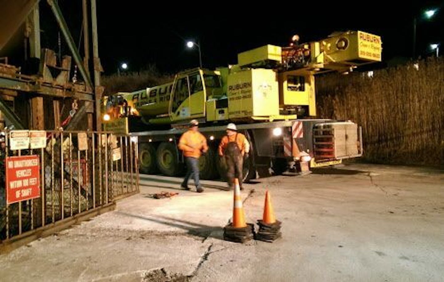 This photo provided by the Ithaca Fire Department shows a crane that will assist the rescue of seventeen miners stuck in an elevator underground at the Cargill Salt Mine in Lansing, N.Y., on Thursday, Jan. 7, 2016. Tompkins County Emergency Management officials say the miners have been trapped since late Wednesday night at the mine, about 40 miles outside Syracuse, and are not in any danger.