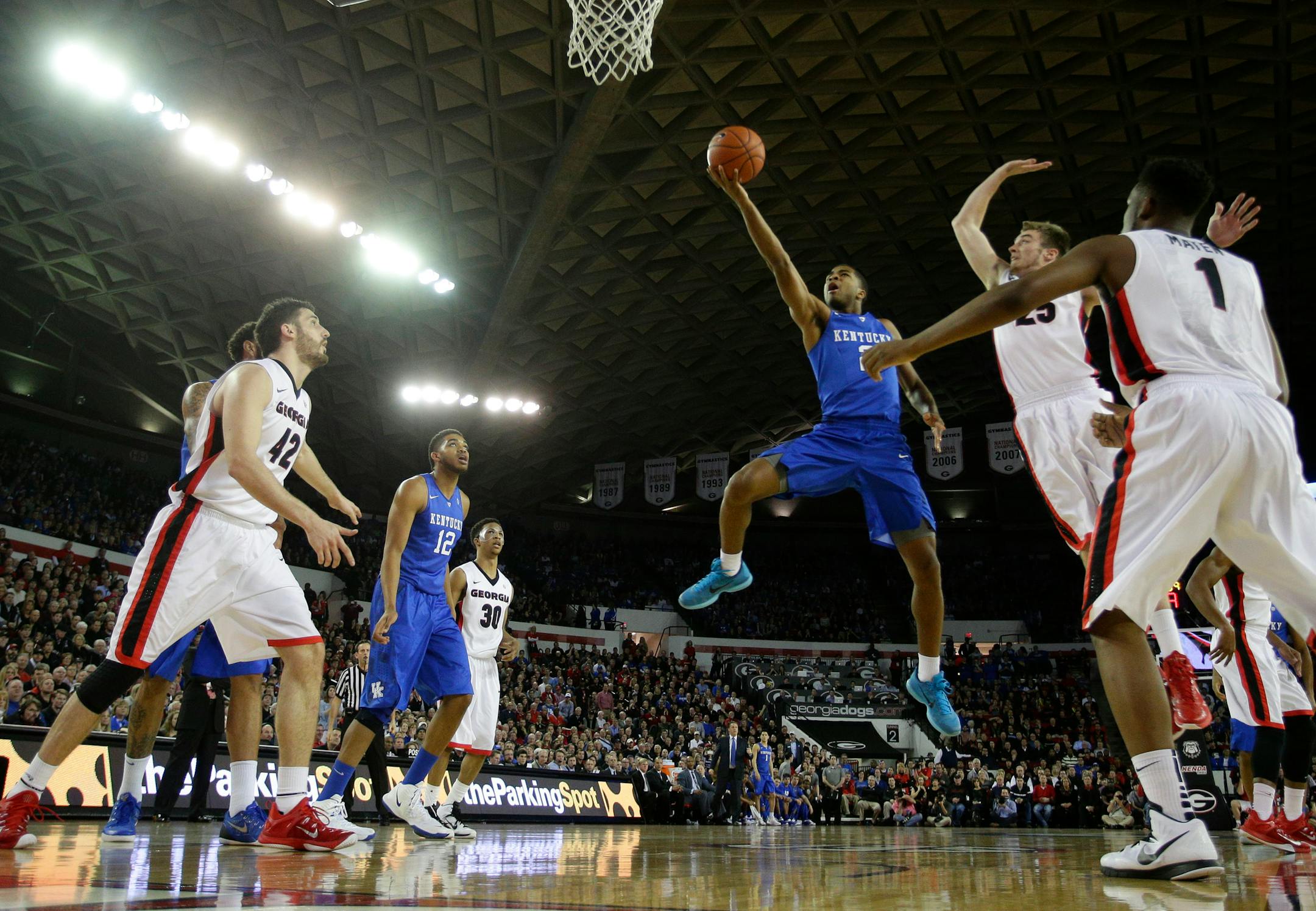 Kentucky's Aaron Harrison (2) drives the lane for a basket in the first half against Georgia at Stegeman Coliseum in Athens, Ga., on Tuesday, March 3, 2015. (Mark Cornelison/Lexington Herald-Leader/TNS) ORG XMIT: 1164802