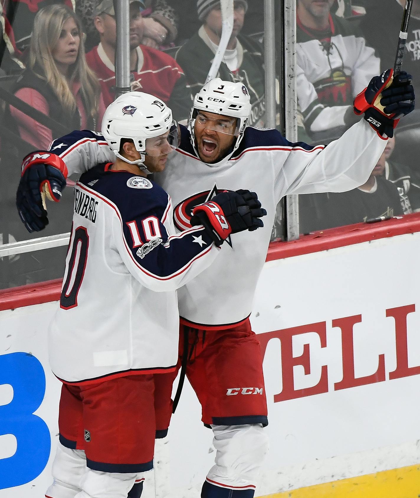 Columbus Blue Jackets defenseman Seth Jones (3) celebrated with center Alexander Wennberg (10) after Wennberg scored the game-winning goal in overtime against the Minnesota Wild. ] AARON LAVINSKY &#xef; aaron.lavinsky@startribune.com The Minnesota Wild played the Columbus Blue Jackets on Saturday, Oct. 14, 2017 at Xcel Energy Center in St. Paul, Minn.