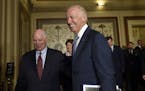 Vice President Joe Biden walks with Senate Foreign Relations Committee members Sen. Ben Cardin, D-Md., left, and Sen. Jeanne Shaheen, D-N.H., center, 