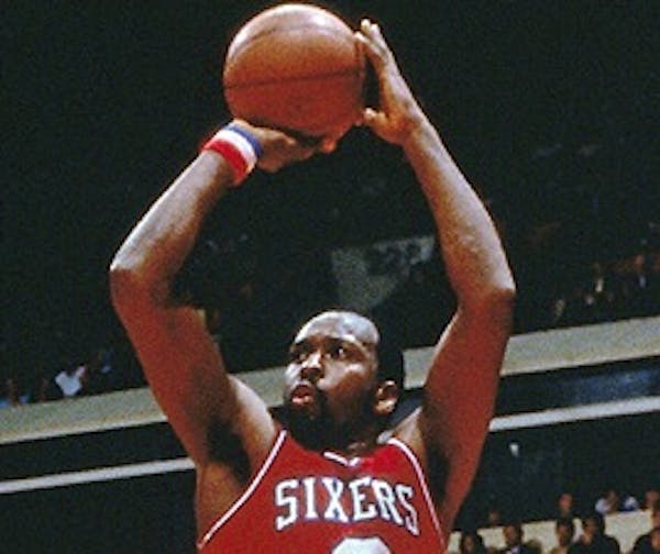 Moses Malone ranks among the leaders in points and rebounds in the NBA.