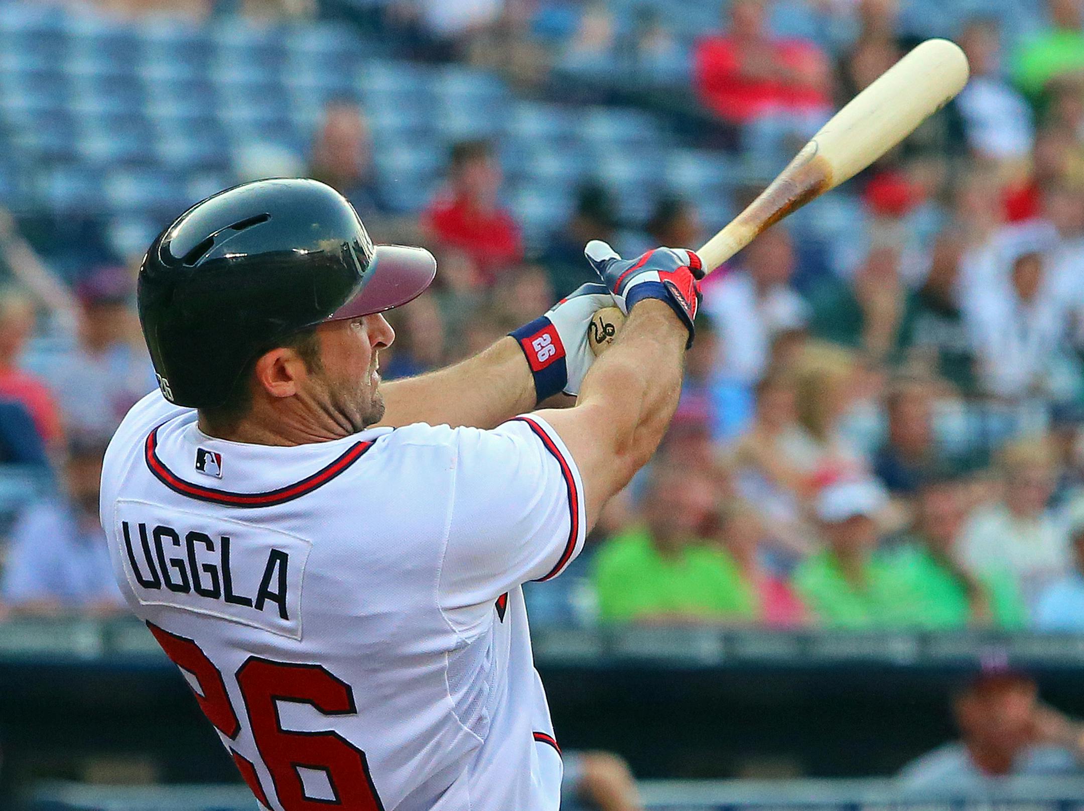 Atlanta Braves Dan Uggla hits a three-run homer against the Minnesota Twins during the first inning Monday, May 20, 2013, in Atlanta, Georgia. (Curtis Compton/Atlanta Journal-Constitution/MCT)