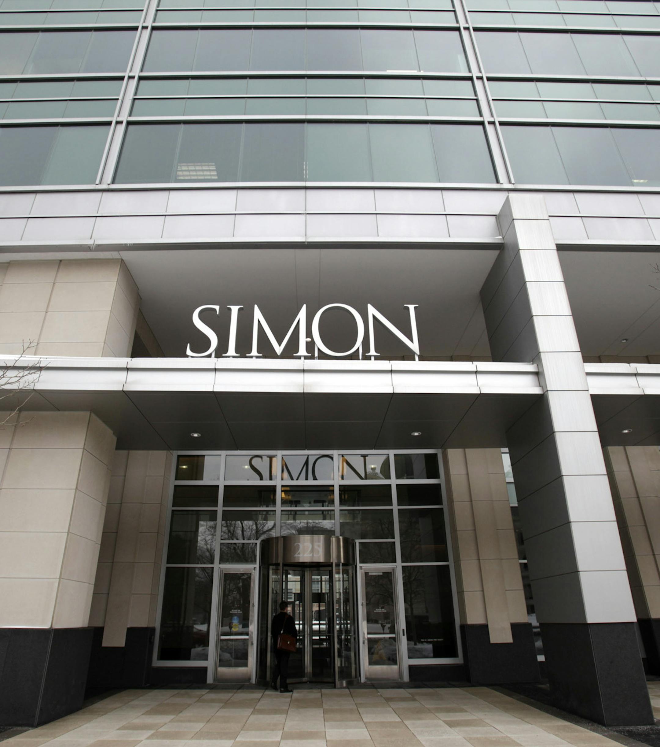 FILE - This Feb. 16, 2010 file photo shows the headquarters of the Simon Property Group in downtown Indianapolis. The Simon Property Group will buy mall operator Taubman Realty in a deal valued at around $3.6 billion as those properties continue to struggle along with their retail tenants. Simon Property Group Inc. said Monday, Feb. 10, 2020, that its operating partnership, Simon Property Group, LP, will buy all of Taubman stock for $52.50 per share. (Danese Kenon/The Indianapolis Star via AP, F