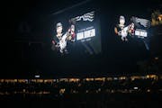 A moment of silence in a dark arena for Adam Johnson before the game. The Minnesota Wild hosted the New Jersey Devils at the Xcel Energy Center on Thu