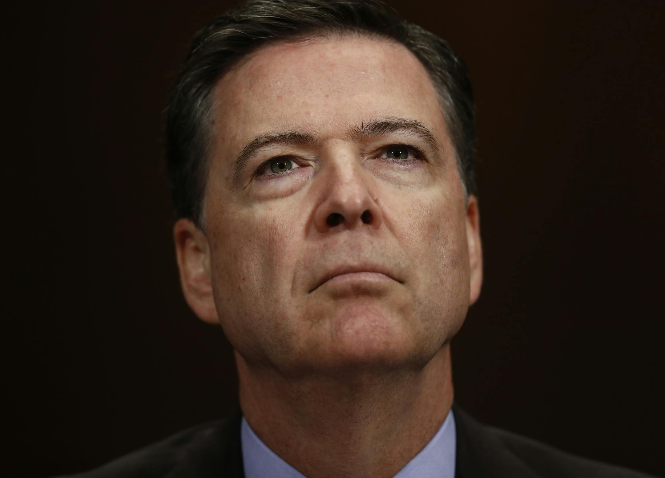 FILE- In this May 3, 2017, file photo, FBI Director James Comey listens on Capitol Hill in Washington. Comey's memo relating President Donald Trumpís request to shut down an investigation of his ousted national security adviser is a powerful piece of evidence that could be used to build an obstruction of justice case against the president. But criminal charges of interfering with an investigation are difficult in ordinary circumstances, several former federal prosecutors cautioned Wednesday