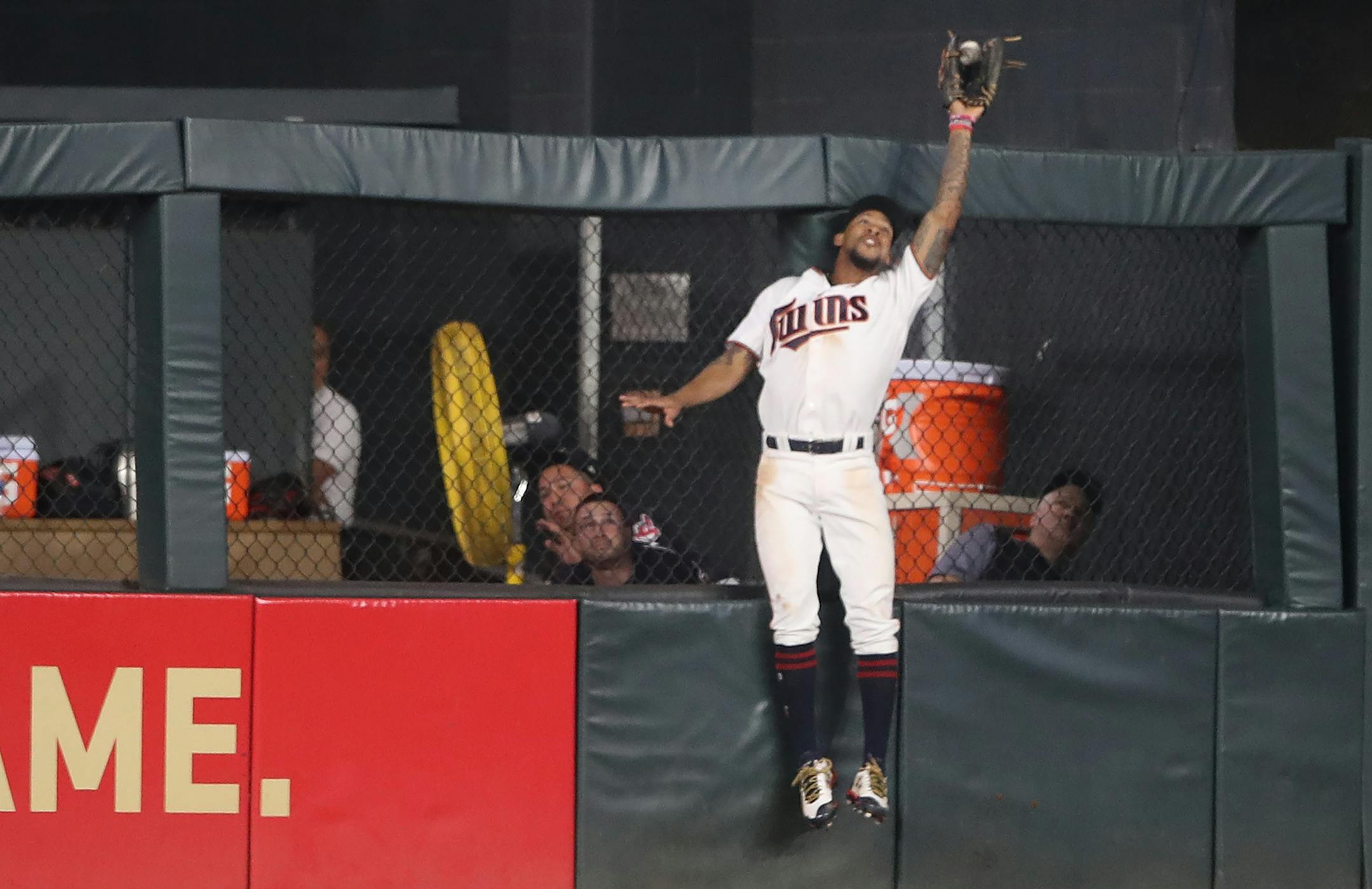 Minnesota Twins center fielder Byron Buxton (25) robbed Cleveland Indians designated hitter Edwin Encarnacion (10) of a home run in the 7th inning at Target Field Tuesday August 15, 2017 in Minneapolis, MN.