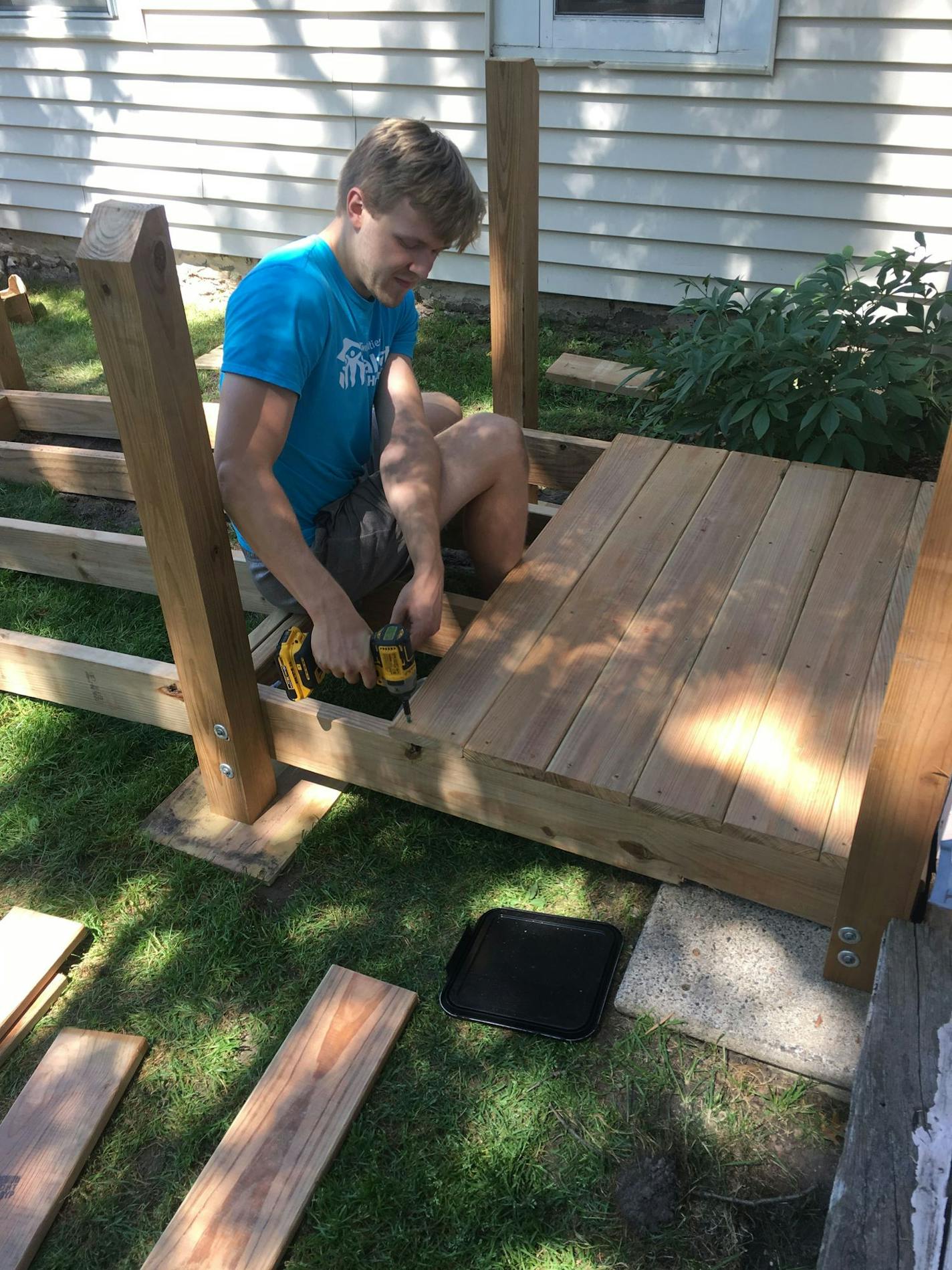 AmeriCorps member Ben Traaseth building a ramp.