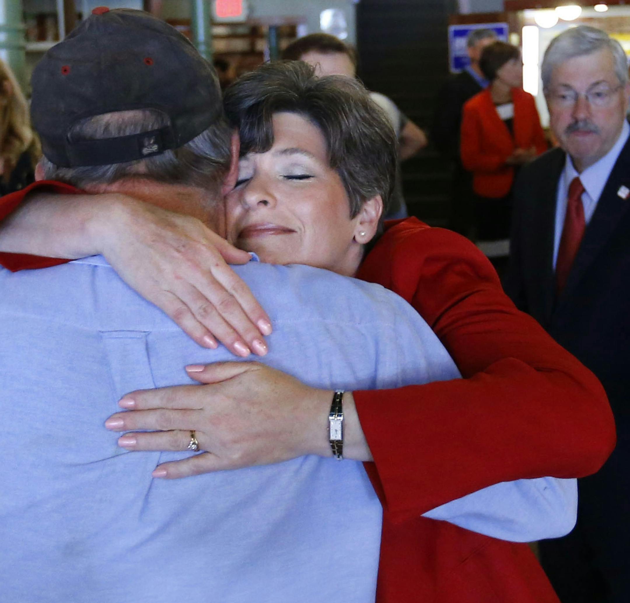 Republican U.S. Senate nominee Joni Ernst receives a hug from a supporter during a rally for Republican candidates at Smokey Row in Oskaloosa, Iowa, on Wednesday morning, June 4, 2014. (AP Photo/The Des Moines Register, Christopher Gannon) MAGS OUT, TV OUT, NO SALES, MANDATORY CREDIT