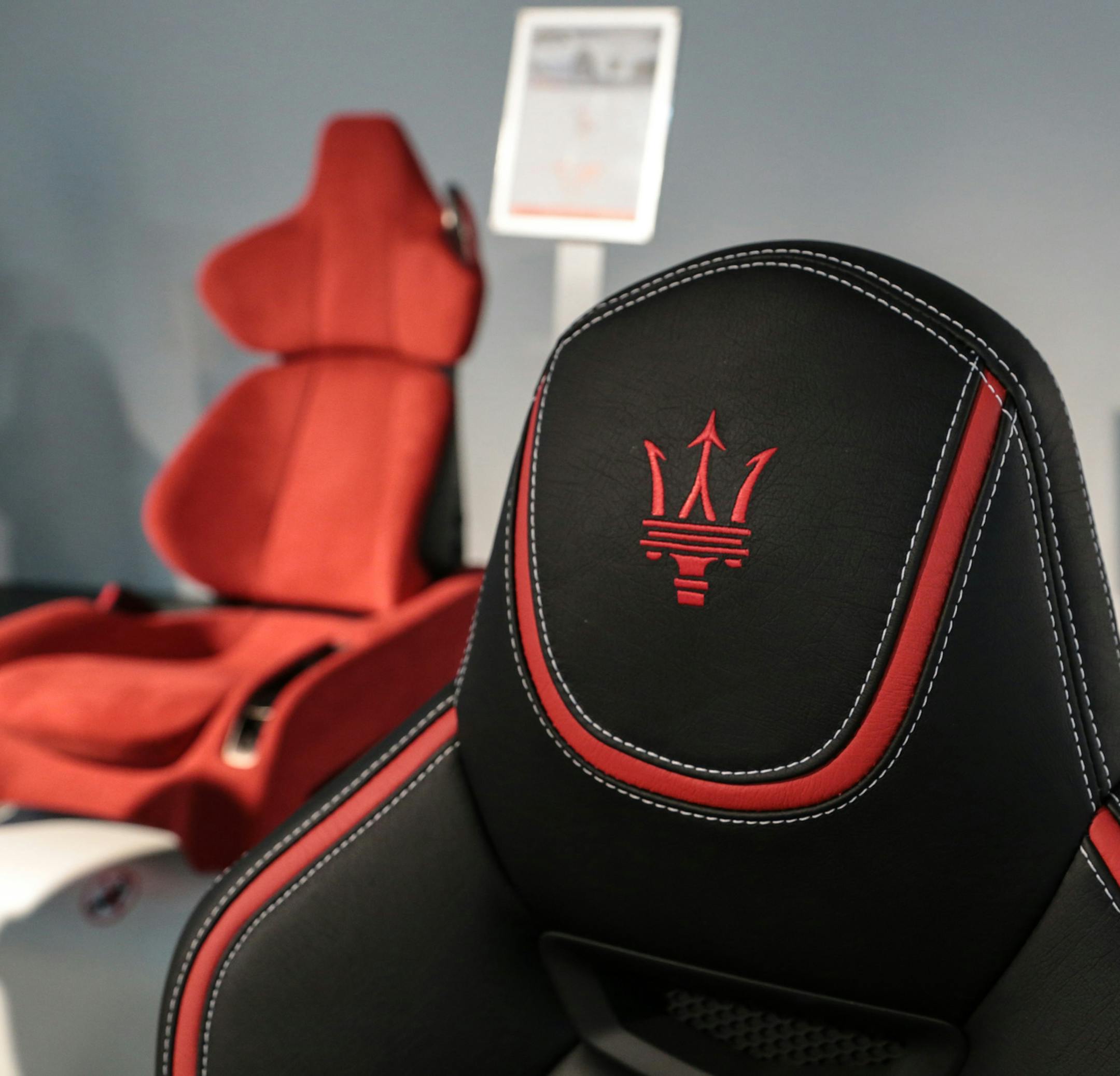 The headrest for a Maserati Grand Turismo seat made by Lear Corporation sits on display at the Lear Global Product and Technology Center on March 11, 2015 in Southfield, Mich. (Ryan Garza/Detroit Free Press/TNS) ORG XMIT: 1173017