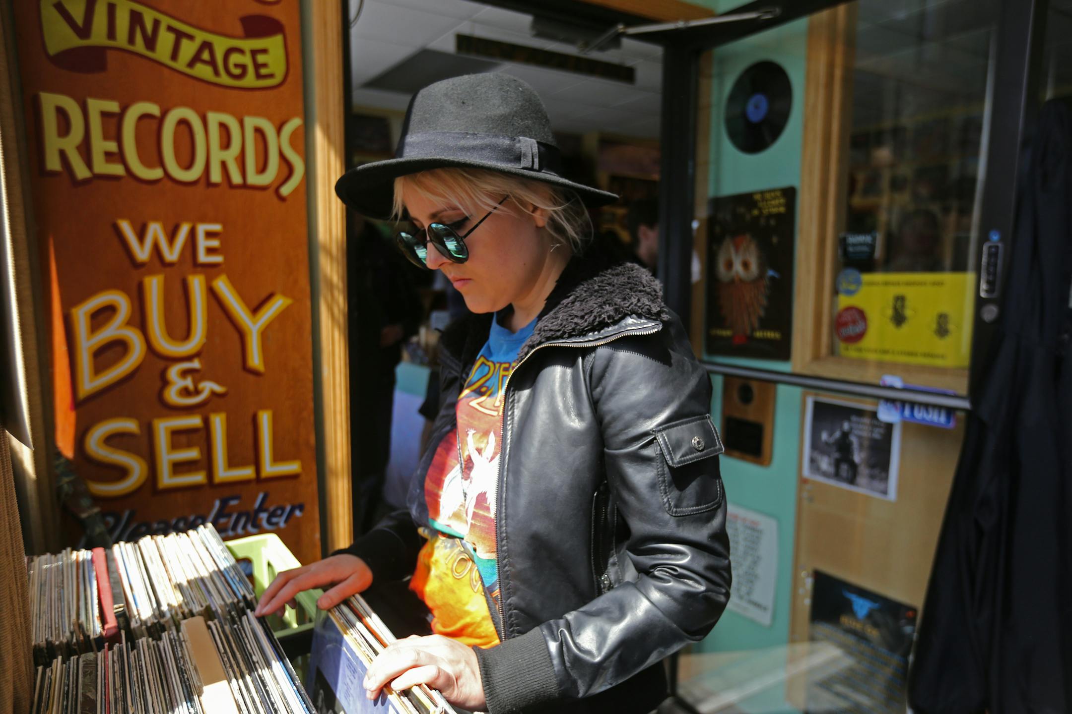 Tiffany Beamer browsed the bins on Record Store Day last year at Hymie's, which is once again hosting a block party Saturday.