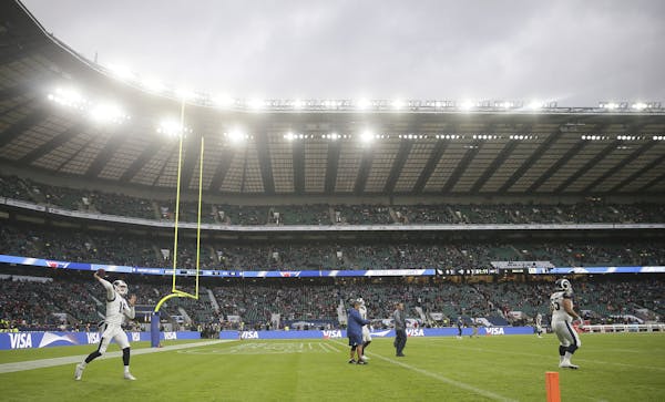 Los Angeles Rams quarterback Jared Goff (16) warms up before an NFL football game against Arizona Cardinals at Twickenham Stadium in London, Sunday Oc