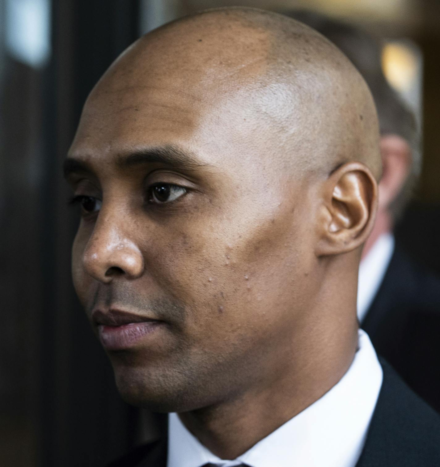 Former Minneapolis police officer Mohamed Noor leaves the Hennepin County Government Center after the first day of trial in Minneapolis on Monday, April 1, 2019. Noor is charged in the July 2017 death of Justine Ruszczyk Damond, who was killed after she called 911 to report a possible sexual assault behind her home. (Evan Frost/Minnesota Public Radio via AP)