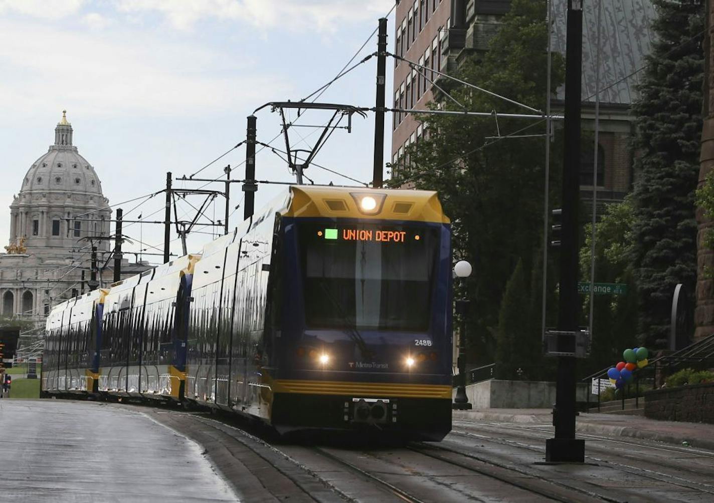 A train leaves the 10th Street station headed west June 14, 2014, in downtown St. Paul.