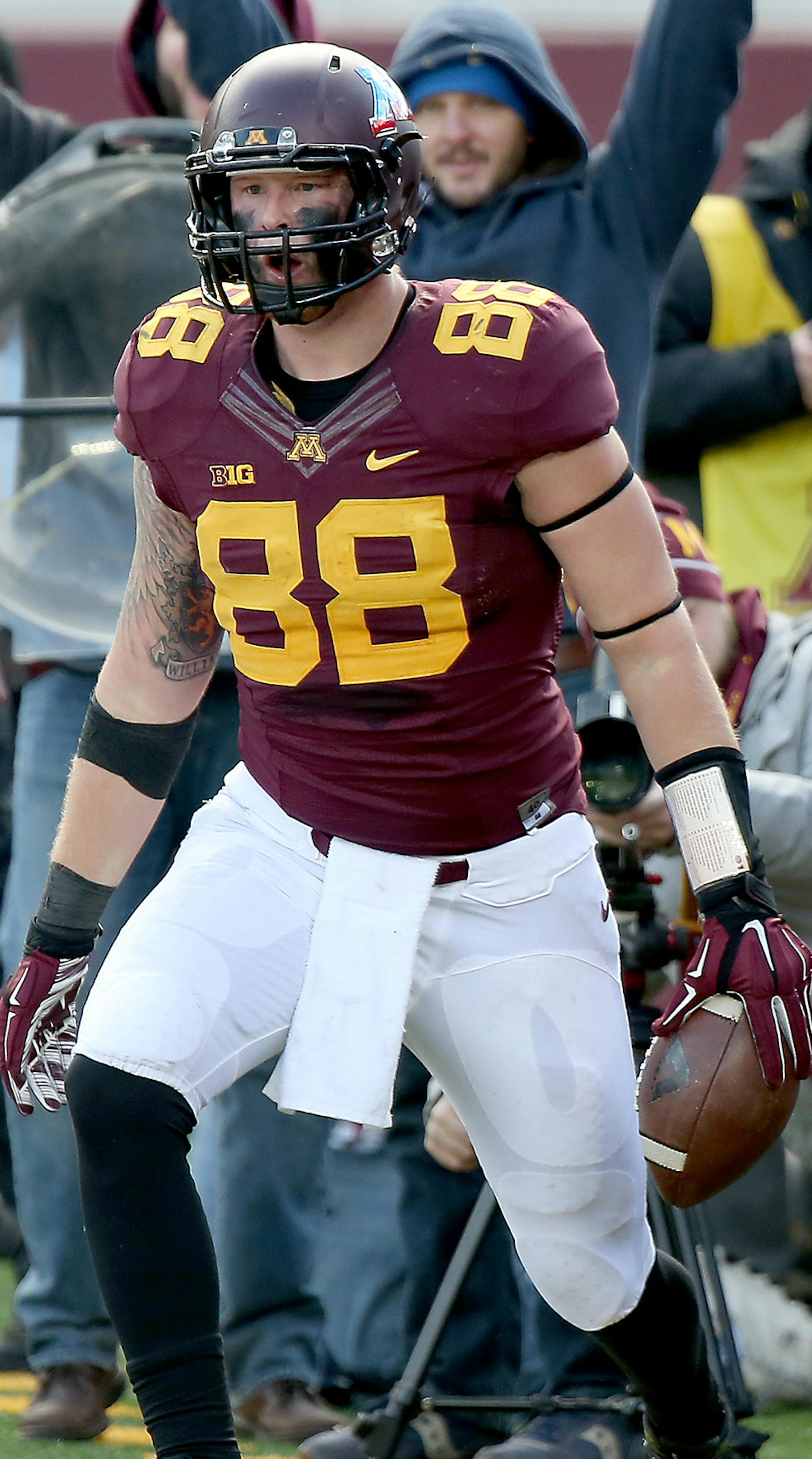Minnesota's tight end Maxx Williams (88) looked back to the end zone after his touchdown in the second quarter as the Gophers took on the Iowa Hawkeyes, Saturday, November 8, 2014 at TCF Stadium in Minneapolis, MN.