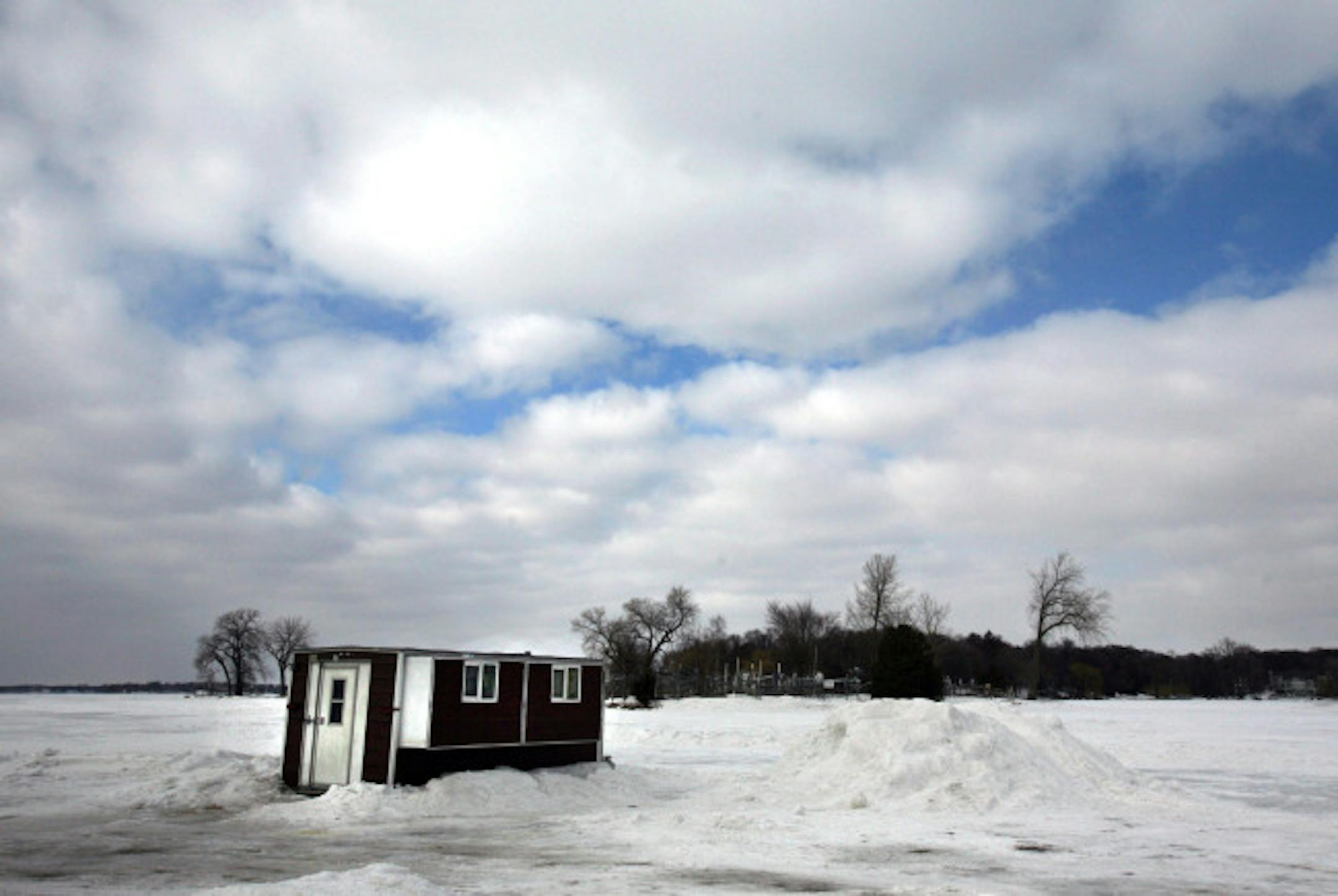 Conservation officers have encountered many ice shelters without proper identification already this season. Remember, all shelters placed on the ice of Minnesota waters must have the complete name and address of the owner or the driver's license number or the nine-digit DNR number on the license of the owner plainly and legibly displayed on the outside in letters and figures at least 2 inches in height. Also, shelters left on the ice overnight need to have at least 2 square inches of reflective