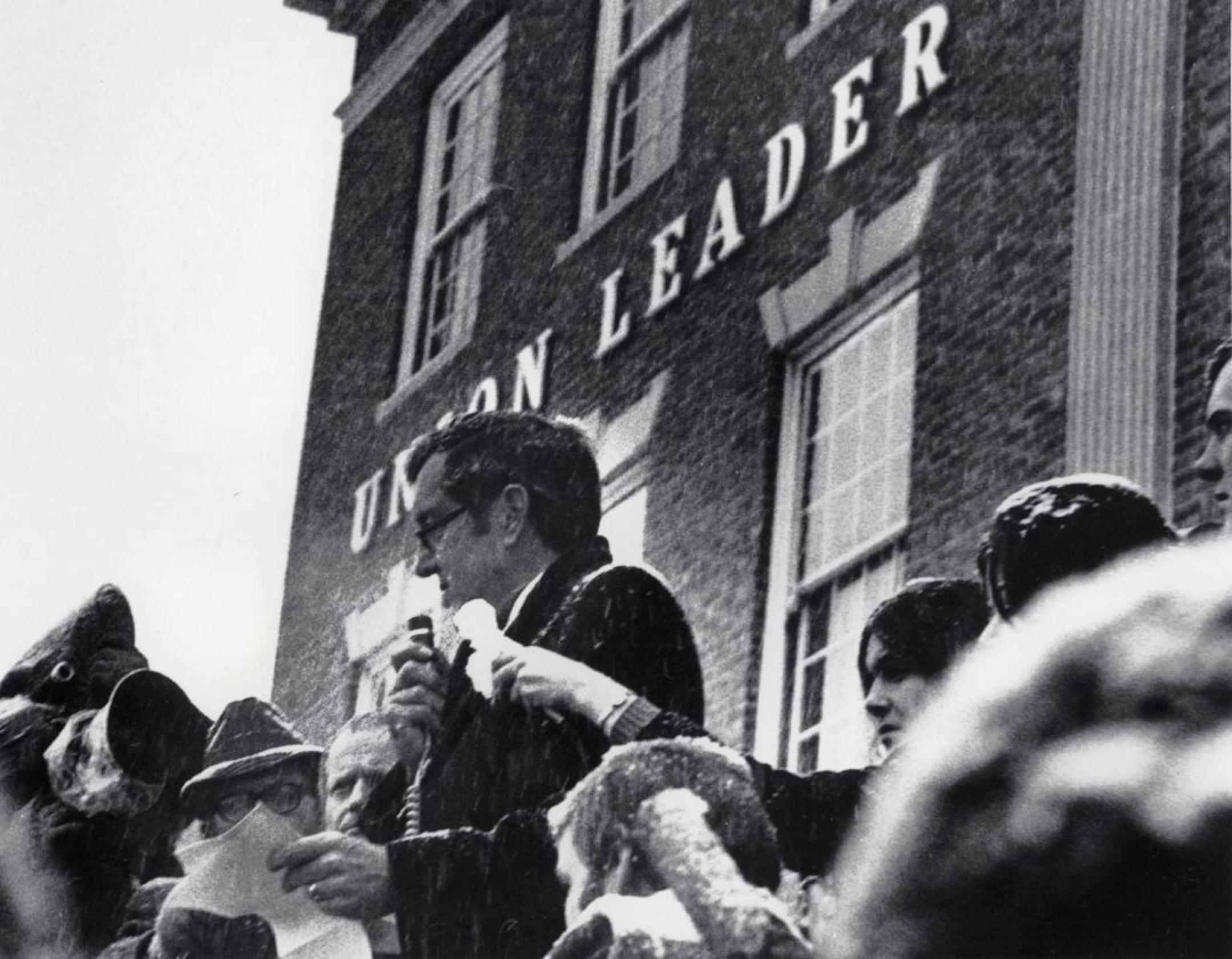 FILE This Feb. 26, 1972 file photo shows Sen. Edmund Muskie, D-Maine, denounces conservative Manchester Union Leader publisher William Loeb in front of the newspaper's Manchester, N.H., building. Muskie's emotional speech came as he campaigned for the New Hampshire primary and the Democratic presidential nomination, which slid off the tracks after it was reported that he had cried in response to the newspaper's attack on his wife. Muskie sustained until his death that it had been melted snowflak