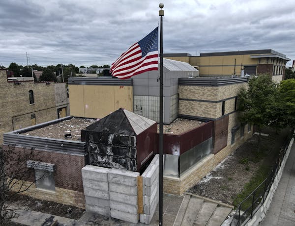 The Minneapolis police Third Precinct station, damaged by fires set after George Floyd's killing.