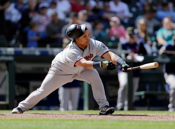 The Twins' Willians Astudillo lost his helmet as he lined out against the Mariners in the eighth inning Sunday. Seattle won 7-4, but the Twins took th