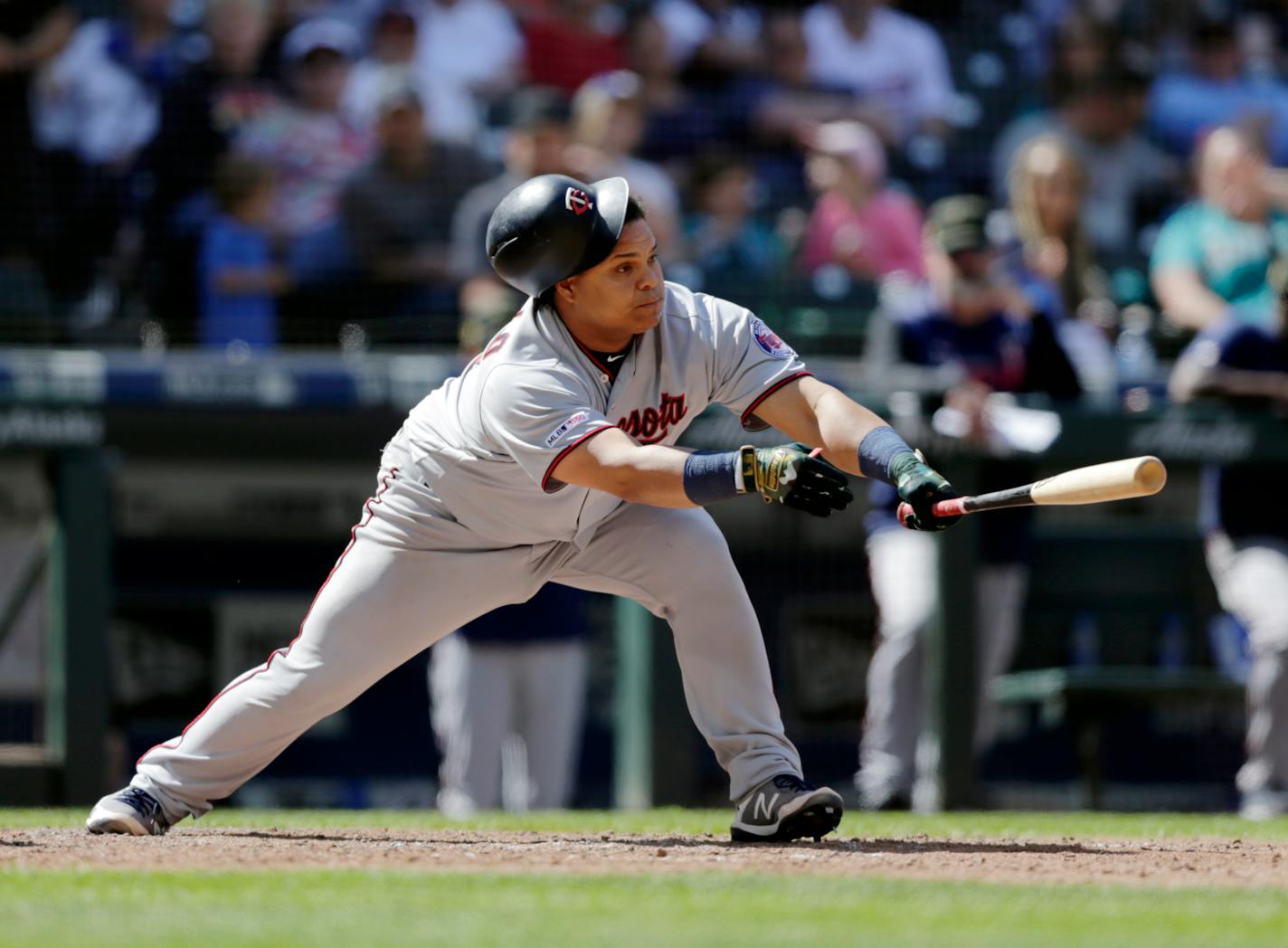 The Twins' Willians Astudillo lost his helmet as he lined out against the Mariners in the eighth inning Sunday. Seattle won 7-4, but the Twins took three of the four-game series.