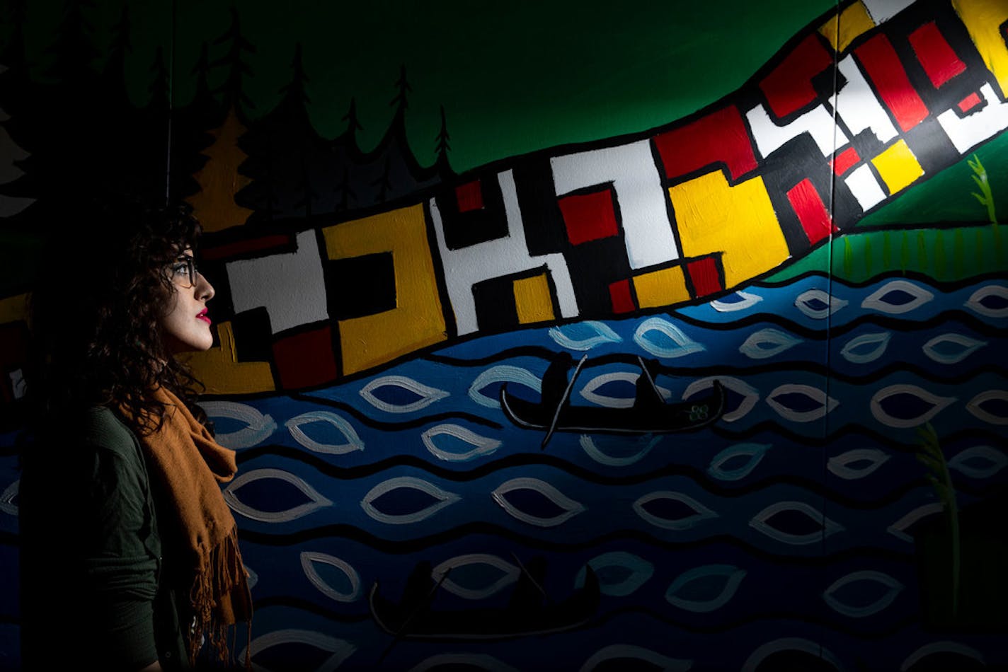 Moira Villiard, a local artist, painted the mural in the Kirby Student Center at the University of Minnesota Duluth. The mural is based on the migration of the Ojibwe to the region.