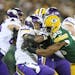 Vikings running back Adrian Peterson was stopped for no gain by Green Bay defensive end Datone Jones in 2016. Jones on Tuesday signed with the Vikings