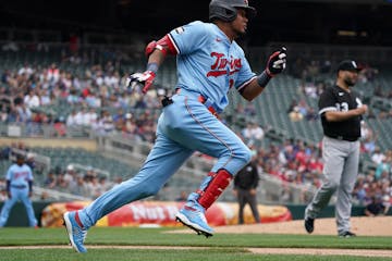 Twins third baseman Luis Arraez (2) sprinted down the first base line after he connected with the ball for a double in the first inning.