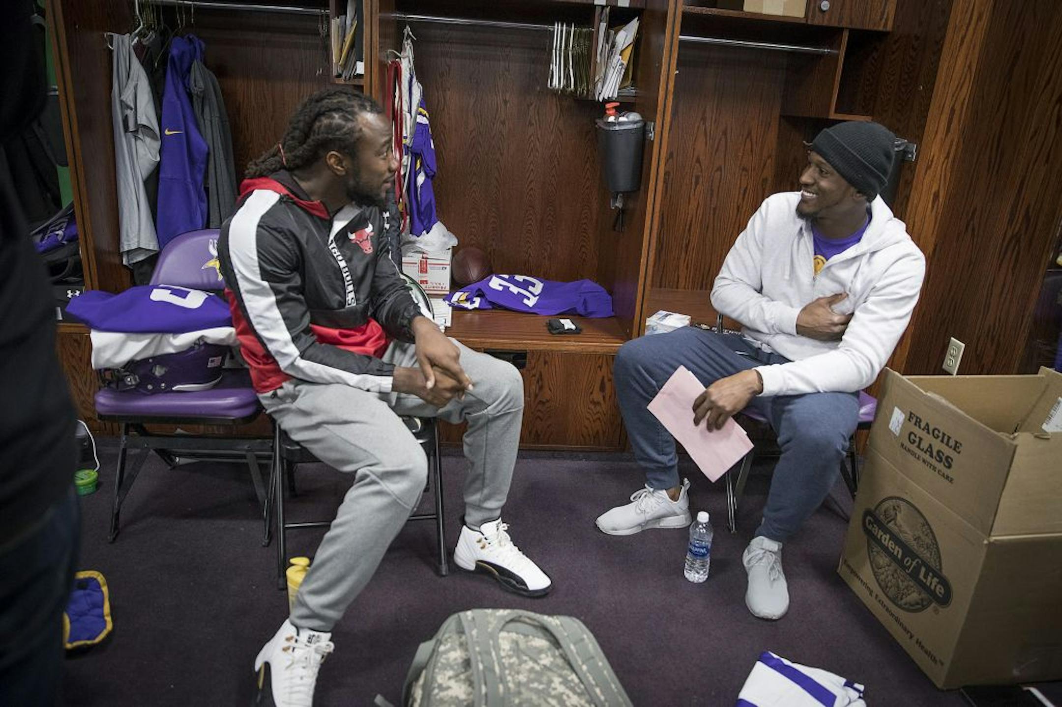Minnesota Vikings running back Dalvin Cook, left, and cornerback Xavier Rhodes chatted after they cleaned out their lockers at Winter Park, Monday, January 22, 2018 in Eden Prairie, MN.