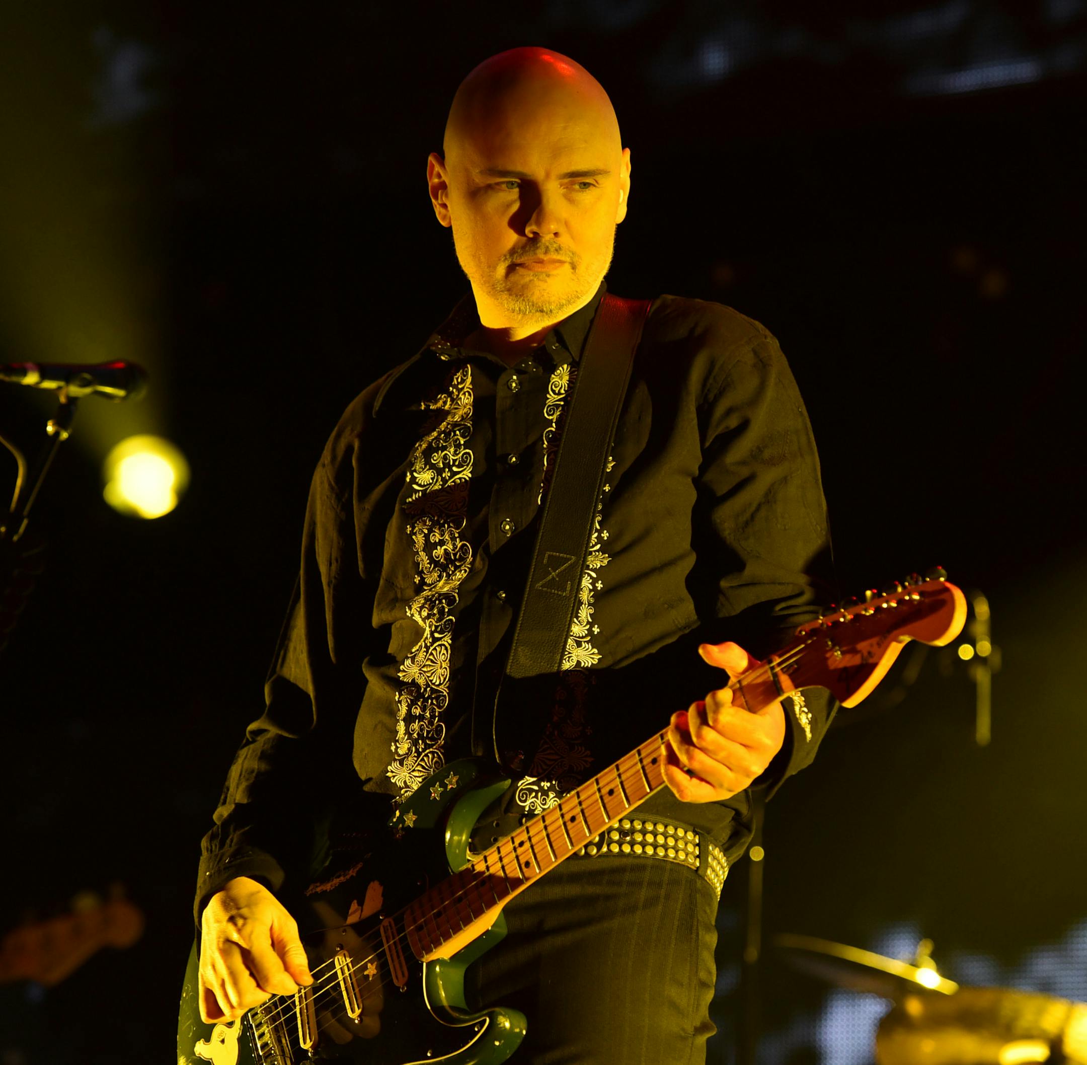 Billy Corgan, of The Smashing Pumpkins, performs at the 25th annual KROQ Almost Acoustic Christmas at The Forum on Sunday, Dec. 14, 2014, in Inglewood, Calif. (Photo by John Shearer/Invision/AP) ORG XMIT: INVW