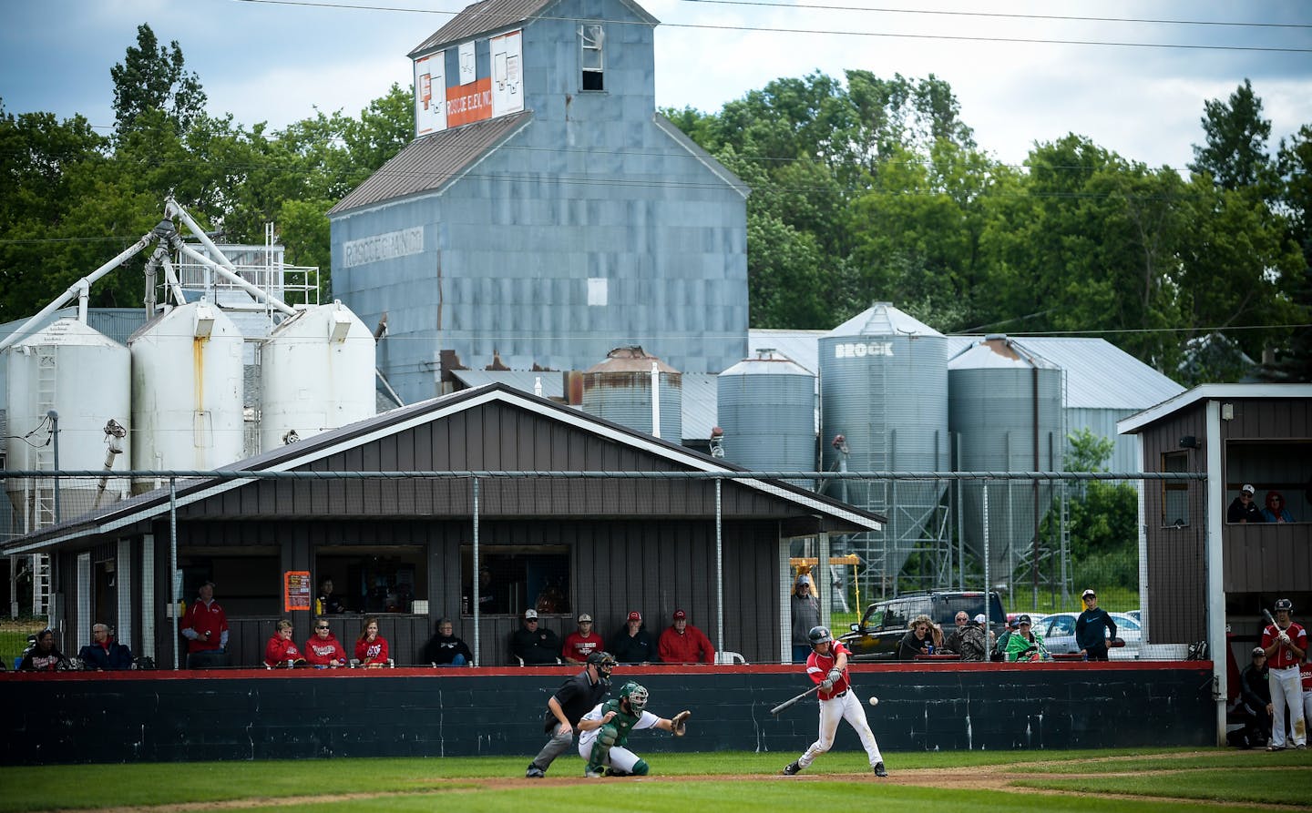 Roscoe's Nathan Stang Greenwald was out at first after grounding out to Greenwal'sd shortstop during a game on Sunday, June 25, 2017 in Roscoe, Minn. ] AARON LAVINSKY &#xef; aaron.lavinsky@startribune.com Feature on the Stearns County summer baseball town league.