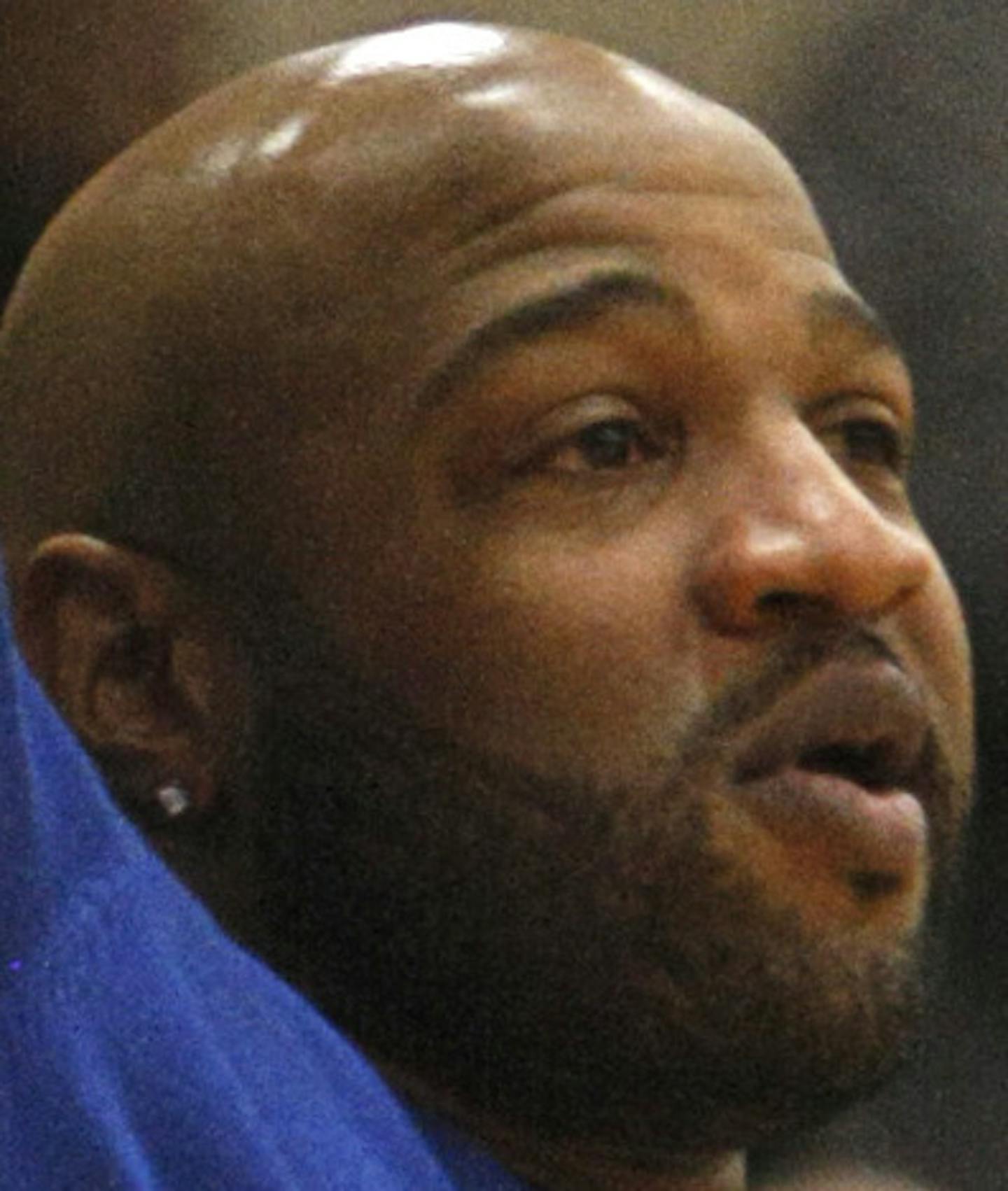 Minneapolis North alaumn Khalid El-Amin cheers on the Polars during the second half of their 83-70 victory at Minneapolis Henry on Friday, January 10. ] Chris Kelleher, Special to the Star Tribune, 1/10/2014, Minneapolis, Minn. EXTRA INFO: 20032636A_PREP011114 ORG XMIT: MIN1401111730471017