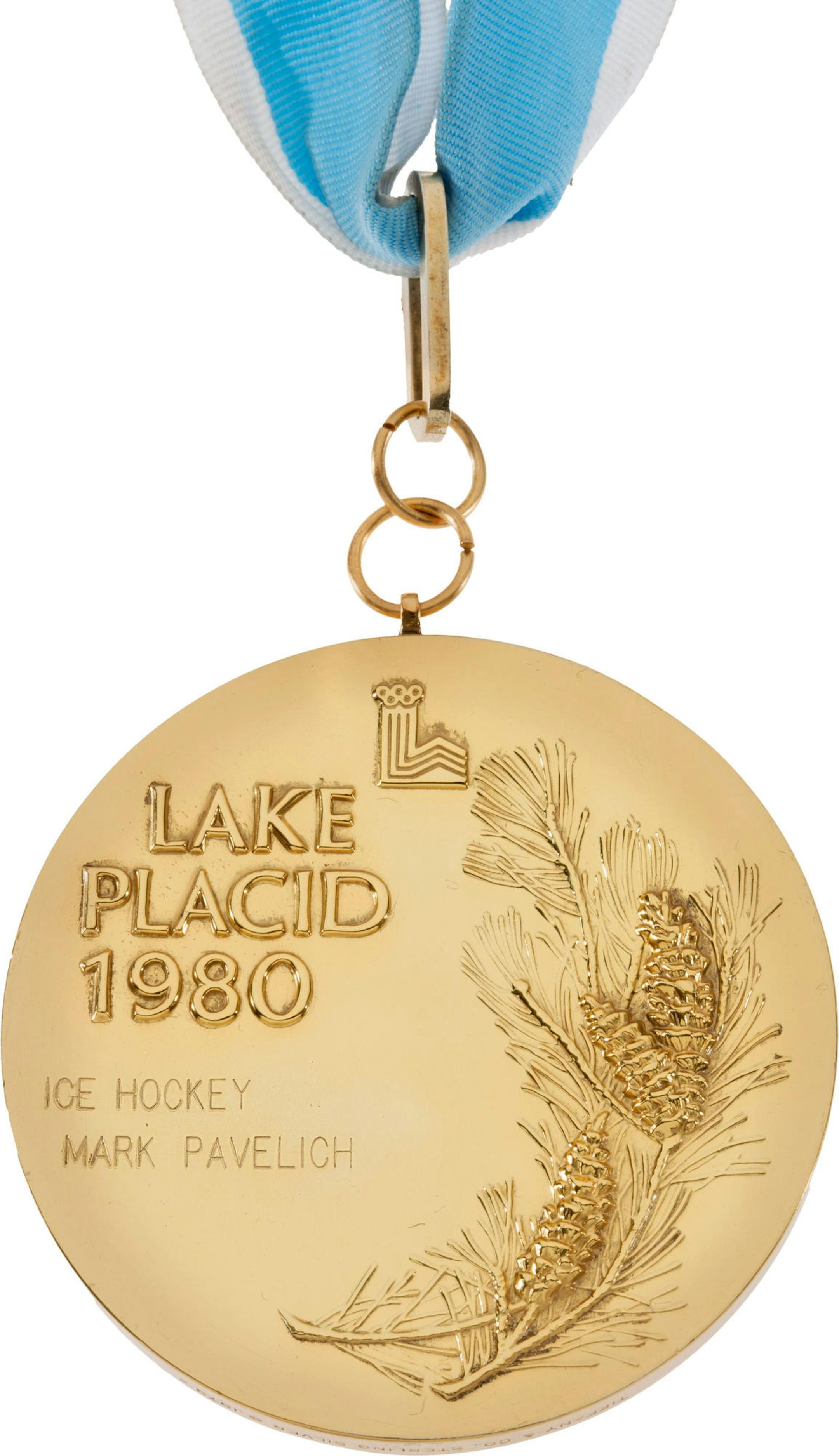 This photo provided by Heritage Auctions shows the Lake Placid 1980 winter Olympic gold medal of U.S. ice hockey player Mark Pavelich. Heritage Auctions of Dallas says it fetched $262,900 in an online-only sale on Friday, May 16, 2014. The company says itís just the second 1980 U.S. Olympic hockey gold medal to reach the block, the first being Mark Wells' medal, which commanded $310,700 in 2010. (AP Photo/Heritage Auctions)