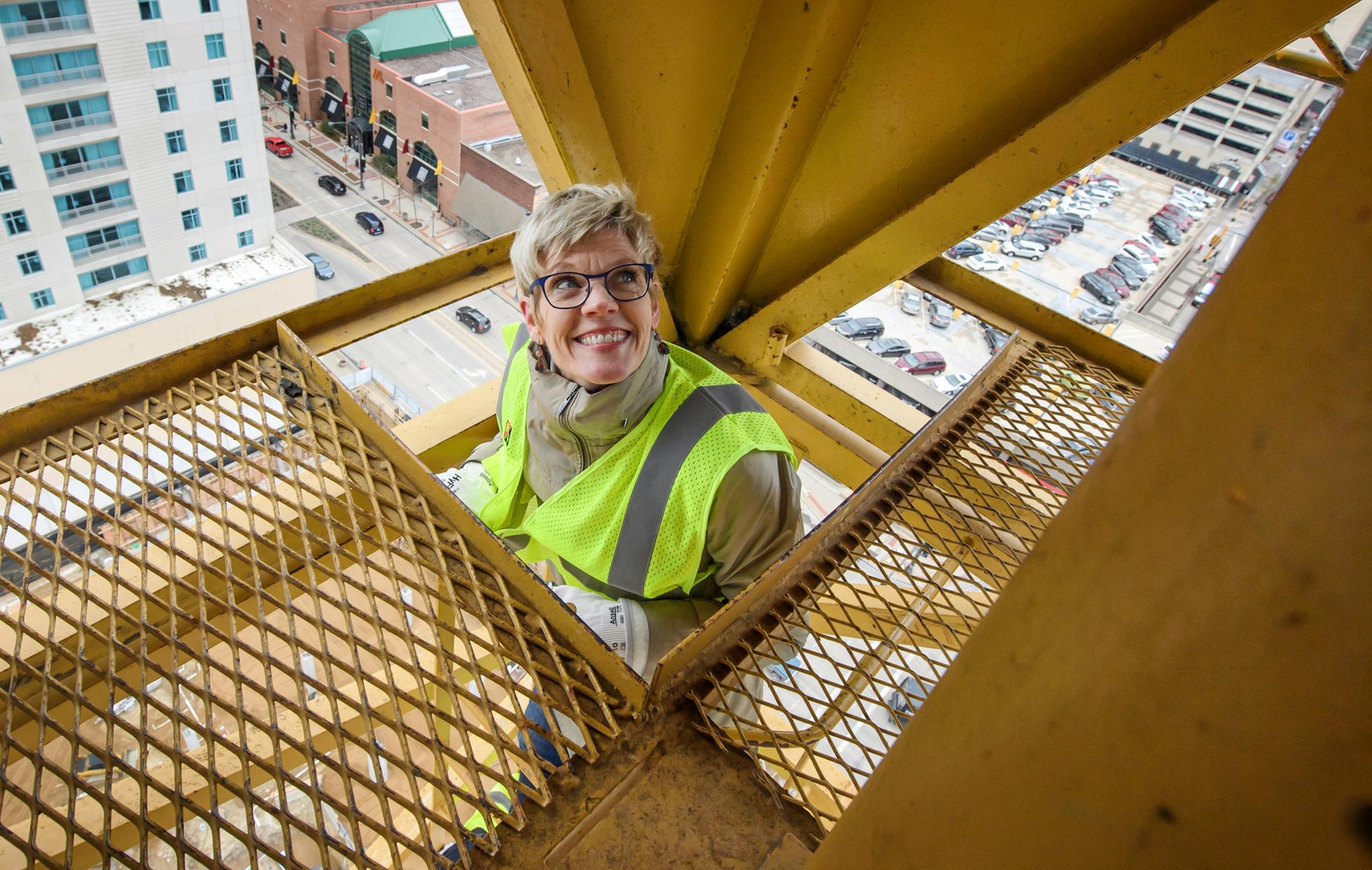 Lisa Clarke, executive director of the DMC Economic Development Agency took in the view from the top of a 189-foot construction crane above the site of a 20-story Titan Hilton is one of the first projects built under Rochester’s DMC initiative. It is a Titan Development project being built by Kraus-Anderson Construction. ] GLEN STUBBE • glen.stubbe@startribune.com Thursday April 27, 2017 Now comes the dirty work. After two years of planning, private investment and clearing the hurd