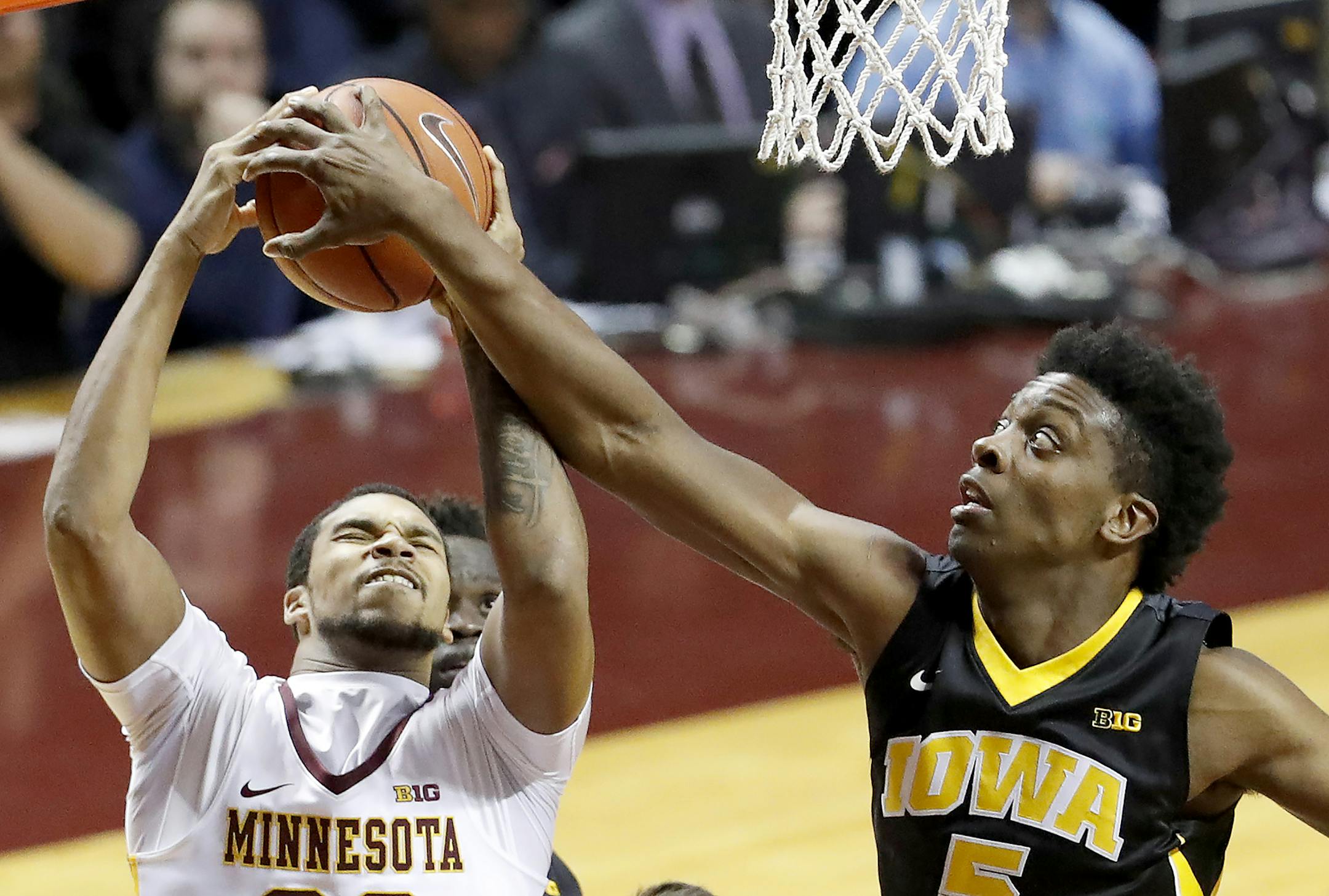 Gophers guard Ahmad Gilbert was fouled by Iowa forward Tyler Cook in the first half Wednesday night.