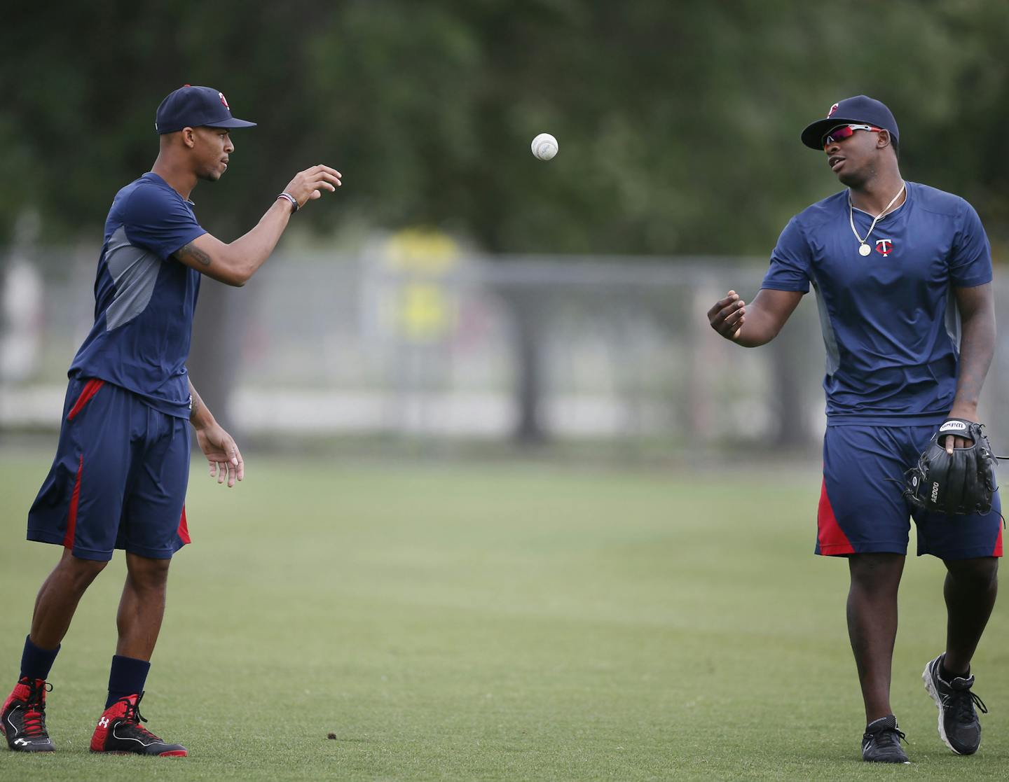 Miguel Sano right caught the ball and tossed the ball for Byron Buxton who is in Fort Myers rehabbing his left wrist. Sano is out for the season after having Tommy John surgery on his right elbow. Minnesota Twins center fielding prospect Byron Buxton remains out with an left wrist injury and continues to rehab it June 3, 2014 in Fort Myers ,Florida. ] Jerry Holt Jerry.holt@startribune.com ORG XMIT: MIN1406101949292315