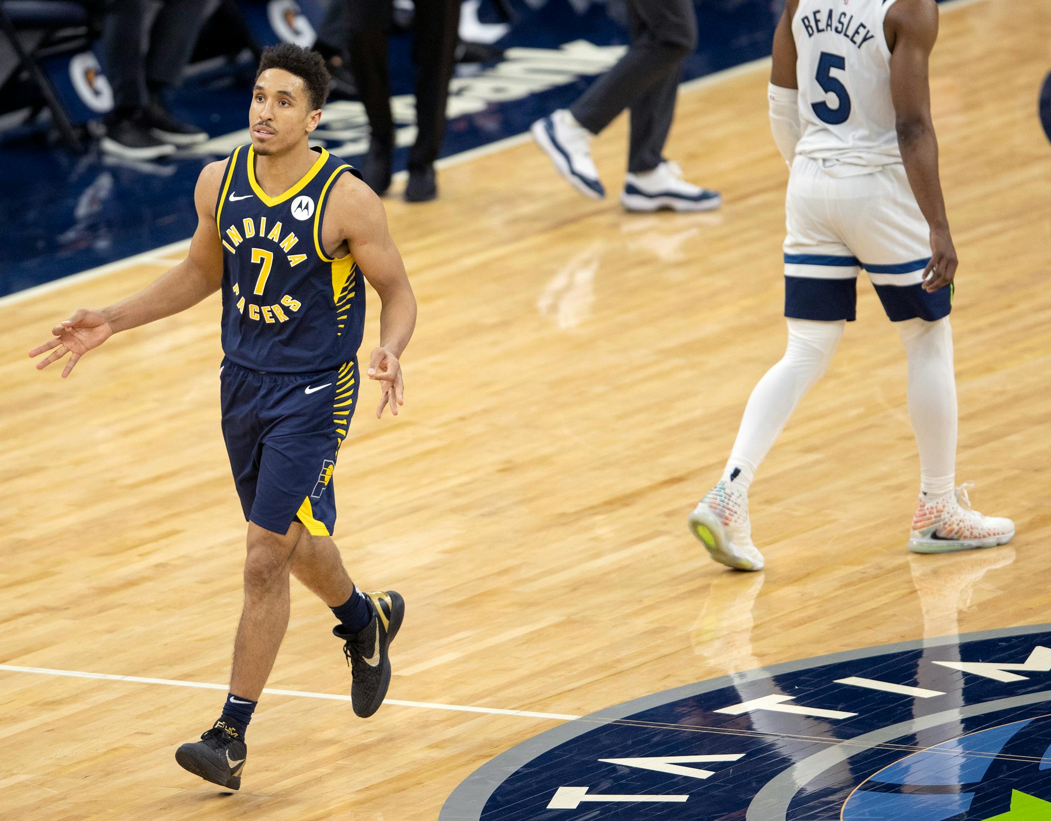 Malcolm Brogdon (7) of the Indiana Pacers celebrated after making a three pointer late in overtime.