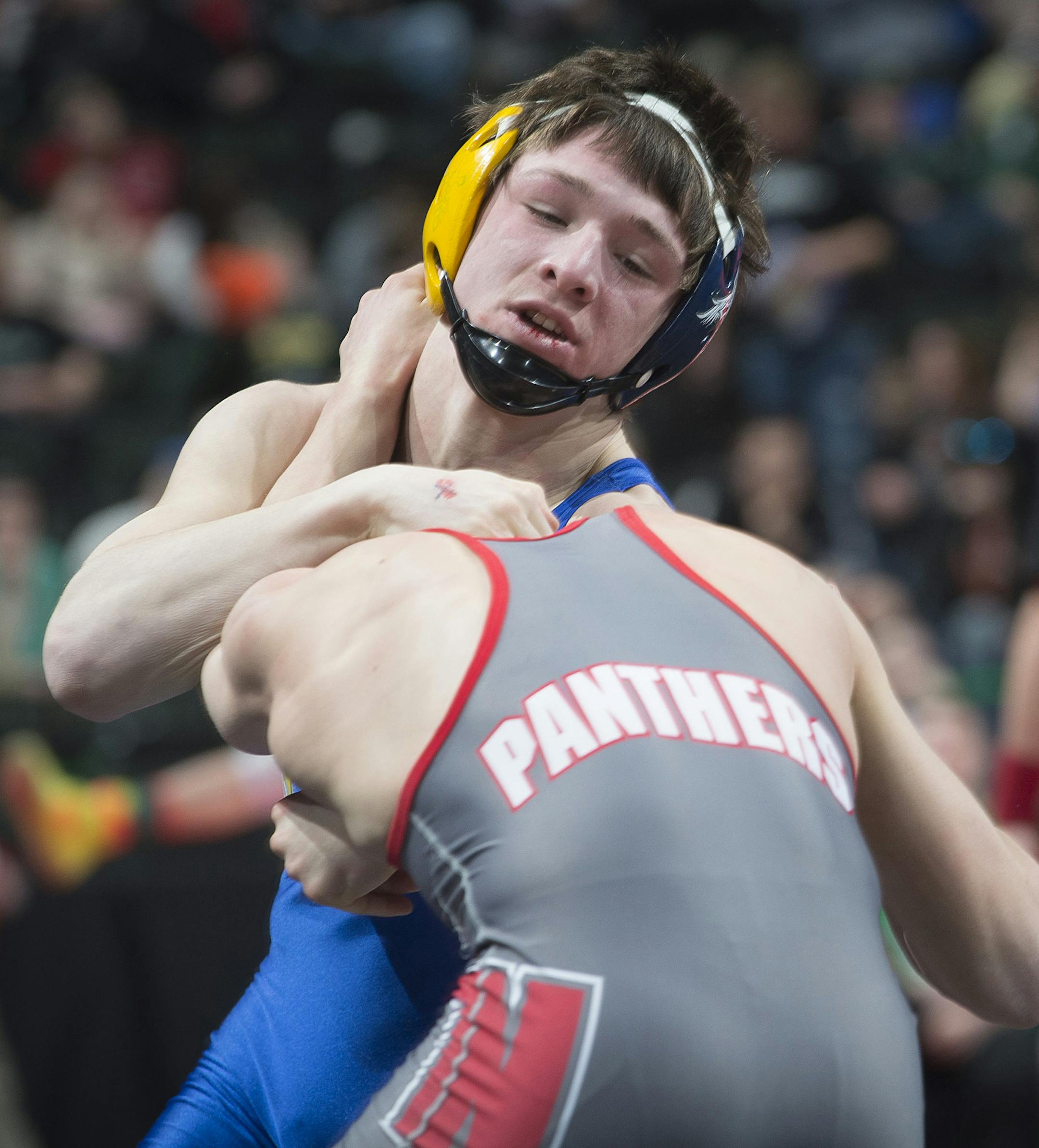 Mitchell McKee, back, of St. Michael-Albertville, wrestles against Wade Sullivan, of Lakeville North, during the Class 3A prelims on Friday night. ] (Aaron Lavinsky | StarTribune) Wrestlers compete in the Class 3A state wrestling individual prelims of the State Wrestling Tournament on Friday, Feb. 27, 2015 at Xcel Energy Center in St. Paul.