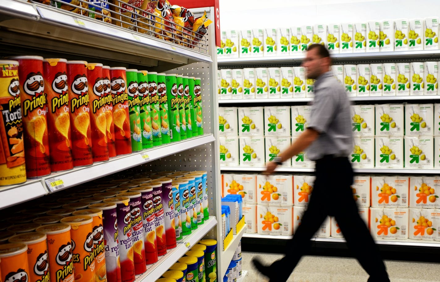 Target Express has a large selection of snack foods, left, and smaller packages of paper towels and toilet paper, right, to cater to the college shoppers. Target Corp's first Target Express store is scheduled to open soon in Dinkeytown next to the University of Minnesota.