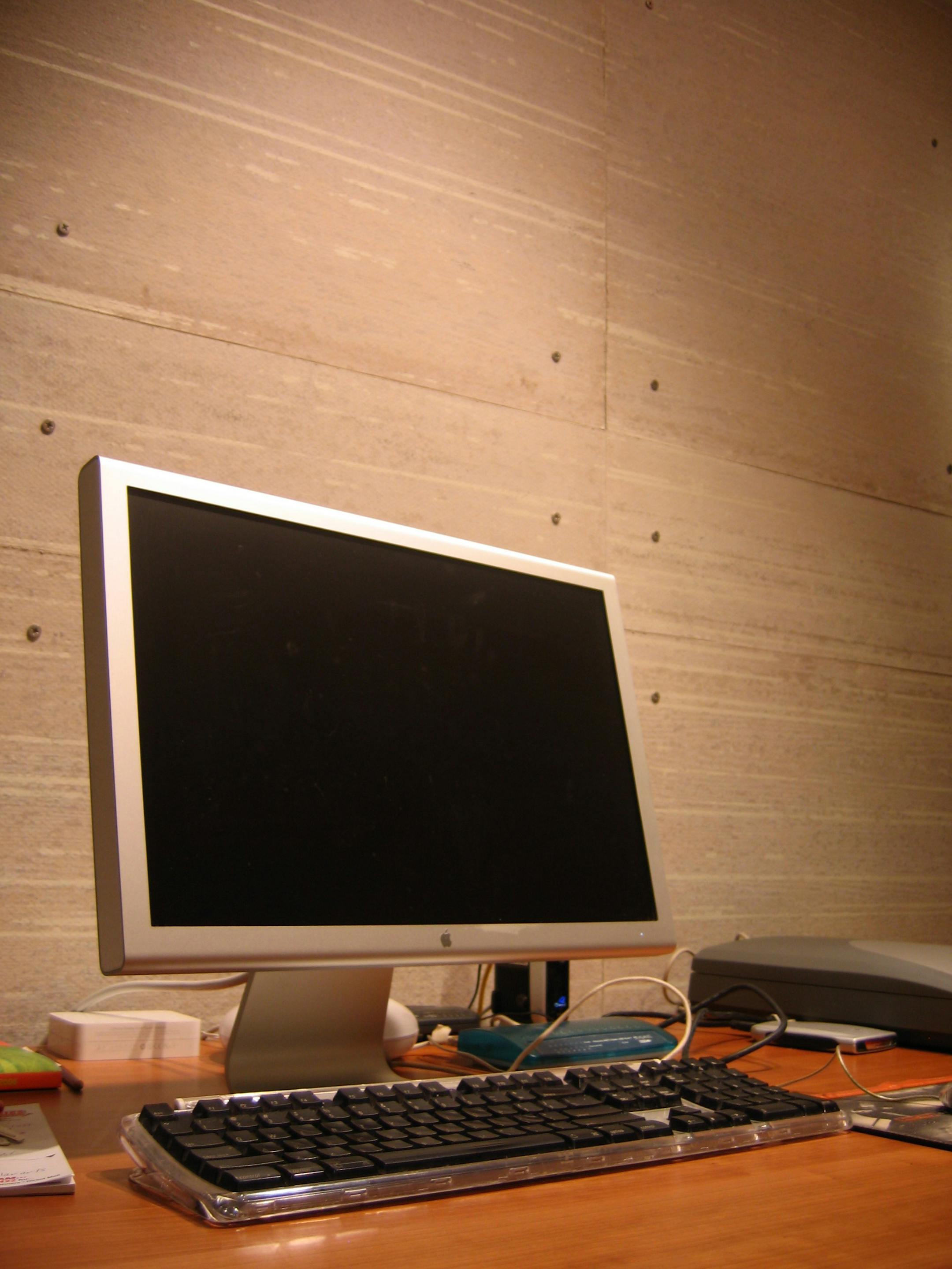 Hardiboard siding retains the look of concrete walls, but allows for insulation in the office.