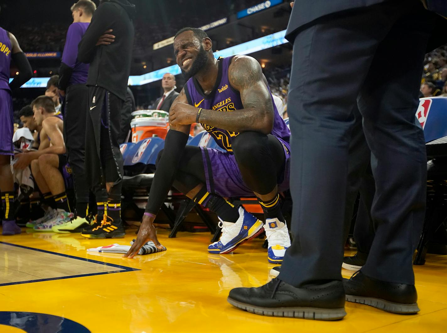 LeBron James grimaced after straining his left groin on Christmas Day, which has forced him to something he rarely does —sit out games