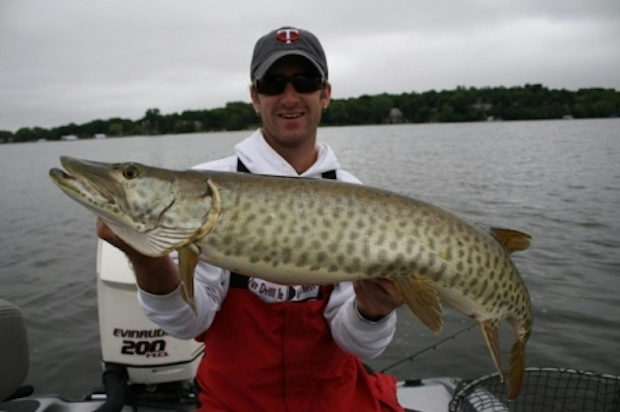 Sean Bailey proudly displays his first muskie of the season caught with Travis right when the conditions all came together!