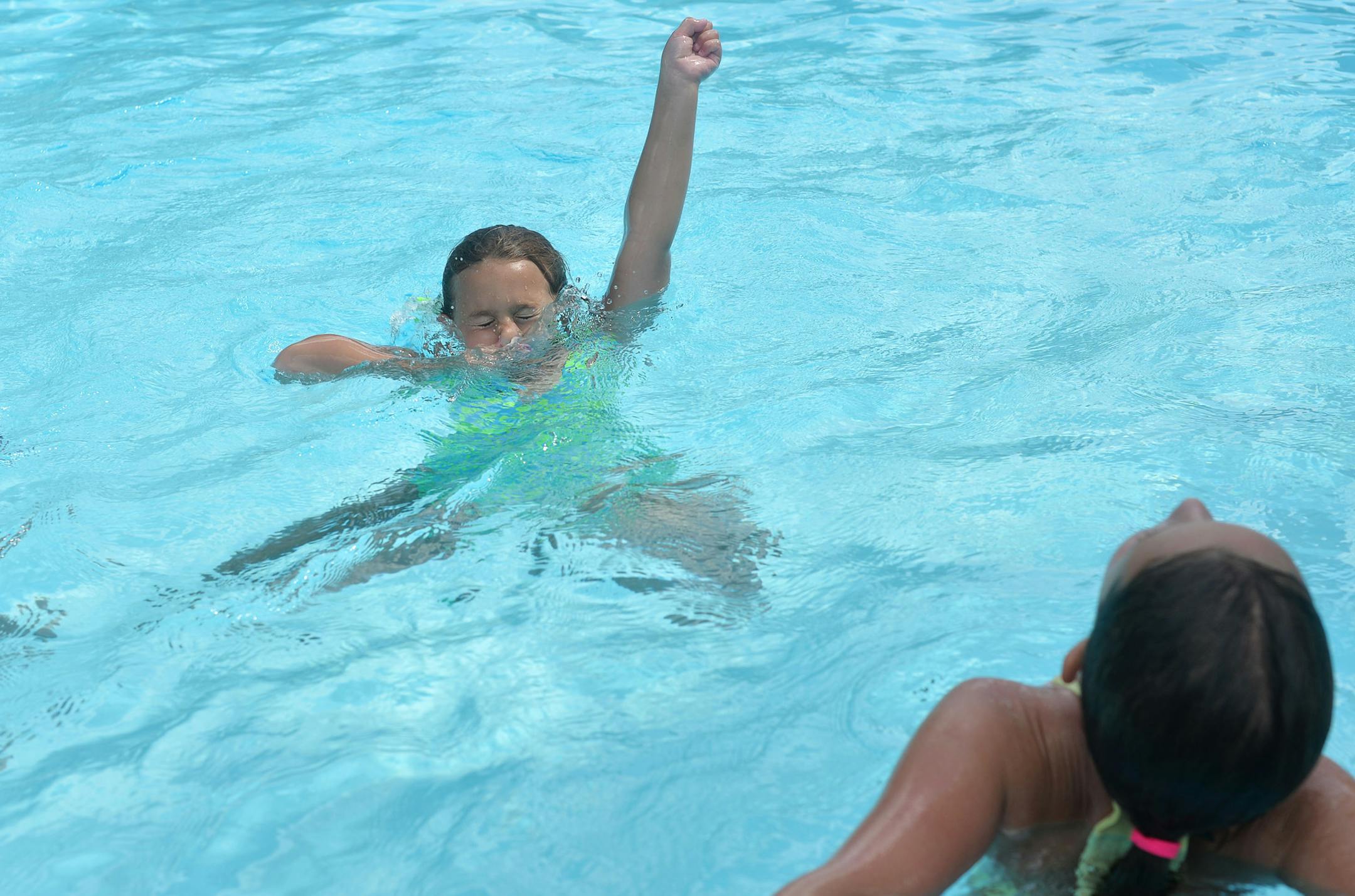 Jessica Smude and Leila Flaherty, both 8 and from Farmington, put their underwater skills to the test in the Farmington pool. A consultant said last year that the pool’s life expectancy is one to three more years.