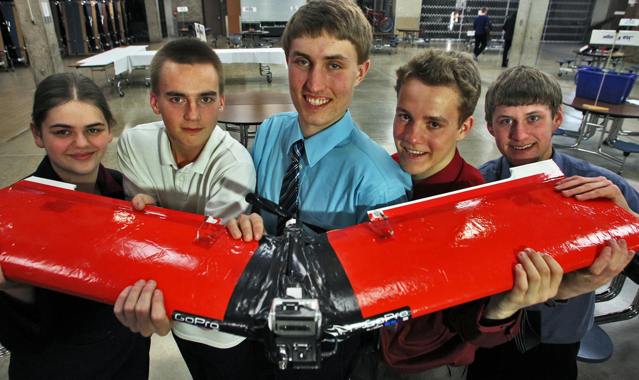 Seniors at Blaine high school enrolled in the Center for Engineering, Mathematics and Science program held a presentation night recently to display their individual projects. These students designed an UAV (unmaned aerial vehicle) carrying video and camera equipment for surveillance purposes. Brandi Alpers, Jon Byman, Kurt Gillund, Zach Porwoll and Nathan Lynum, l-r.
(MARLIN LEVISON/STARTRIBUNE(mlevison@startribune.com (cq -program)