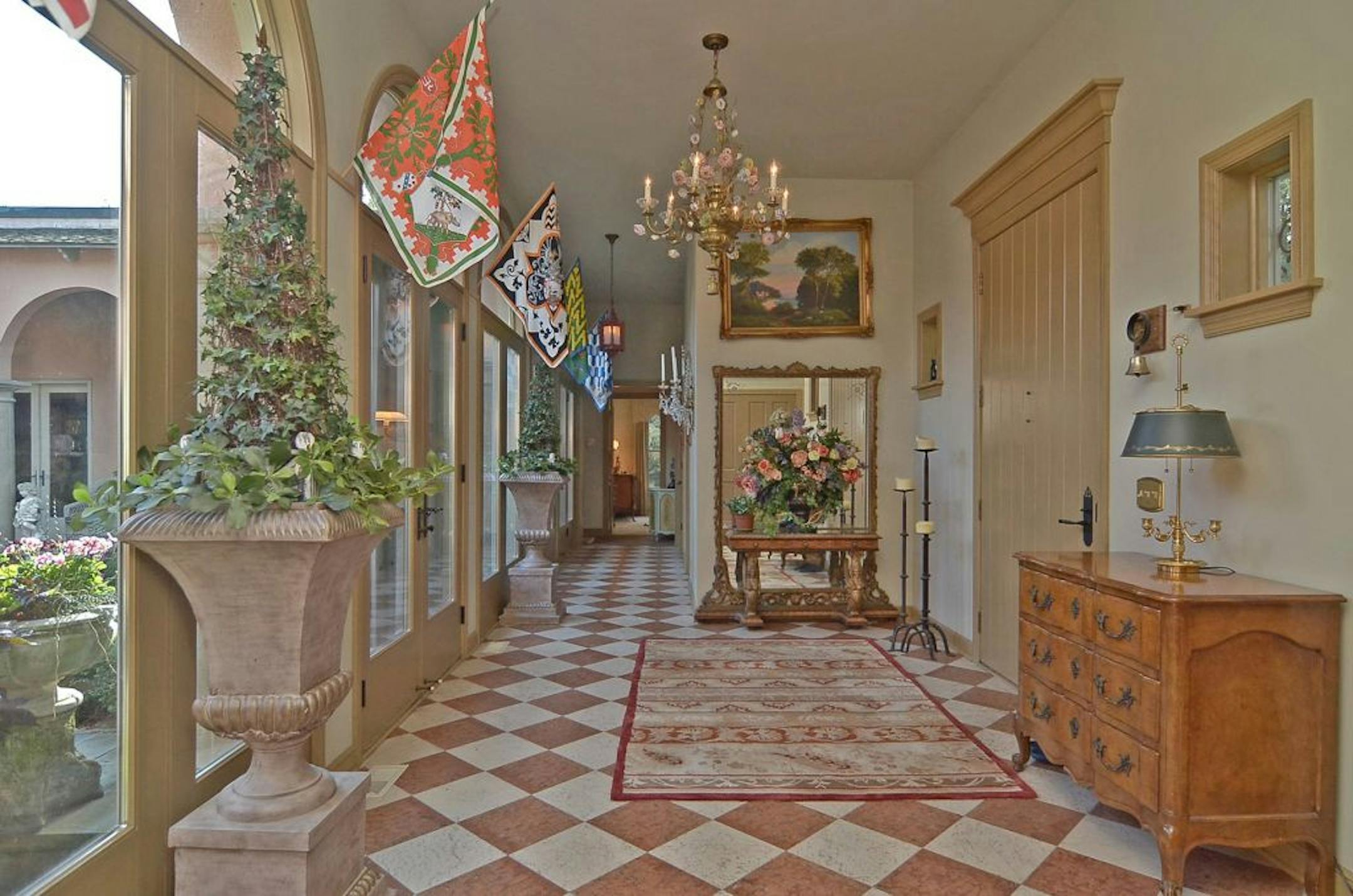 The entry of a suburban re-creation of an Tuscan-style Italian villa in Bloomington.