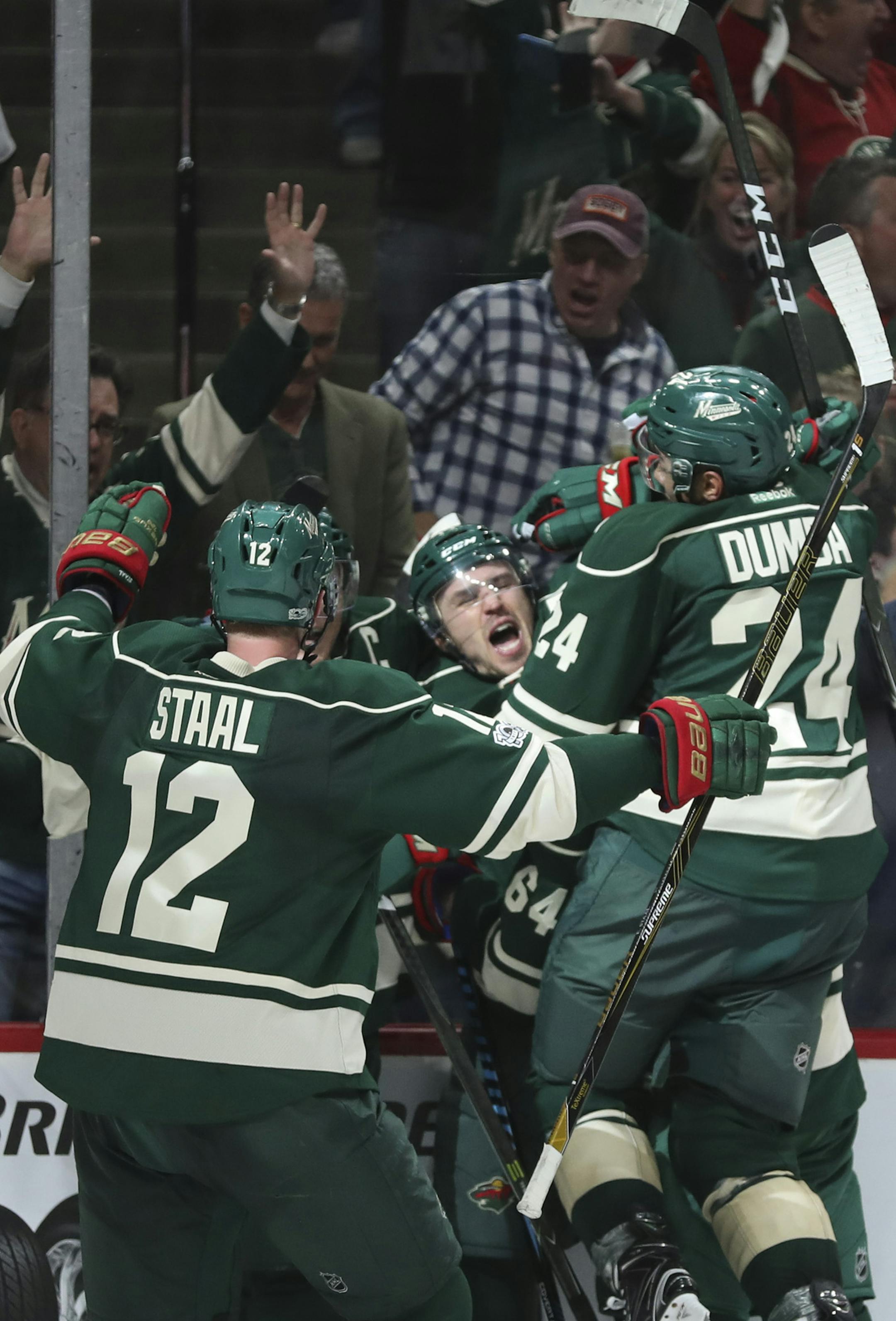 Teammates mobbed Minnesota Wild left wing Zach Parise (11) after he tied the game with about 23 second left in the game. ] JEFF WHEELER ï jeff.wheeler@startribune.com The Minnesota Wild faced the St. Louis Blues in Game 1 of their first round NHL playoff series Wednesday night, April 12, 2017 at Xcel Energy Center in St. Paul.