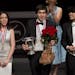 Cliburn medalists Beatrice Rana, 2nd place winner, Vadym Kholodenko, first place winner, and Sean Chen, third place winner, receive applause from the 