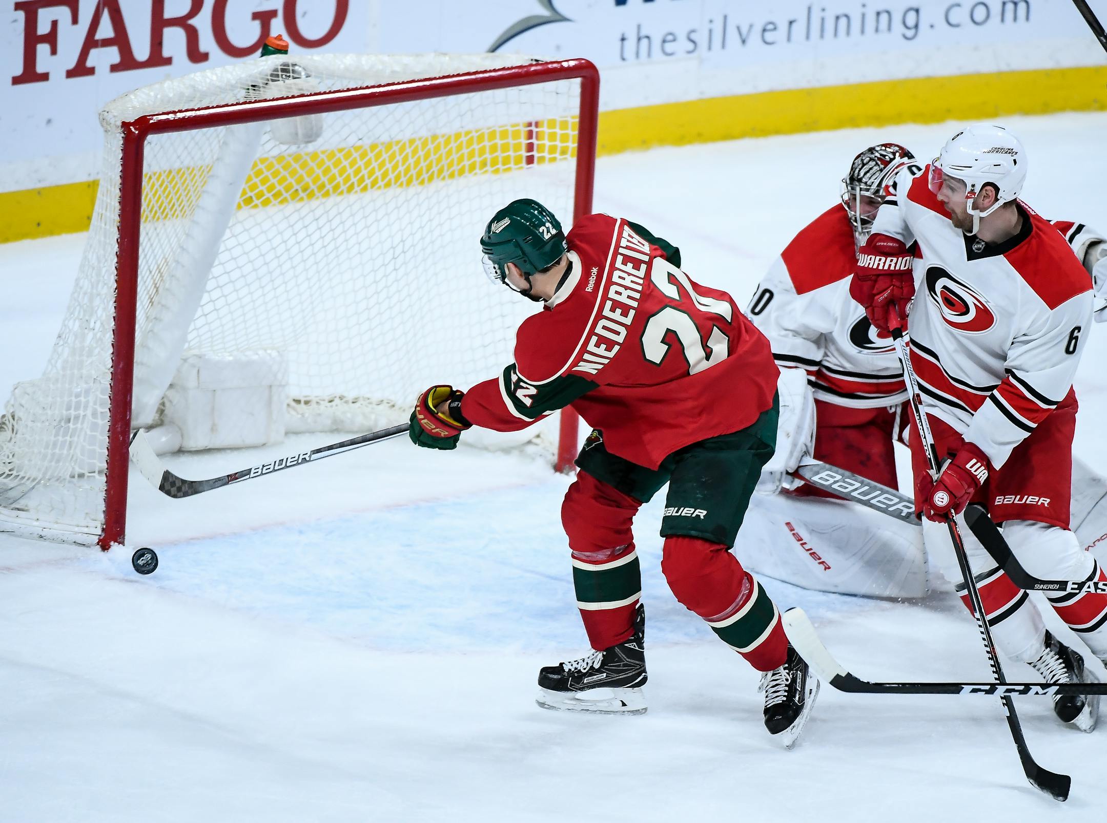 Wild right wing Nino Niederreiter (22) scored a goal past Carolina Hurricanes goalie Cam Ward (30) in the first period.